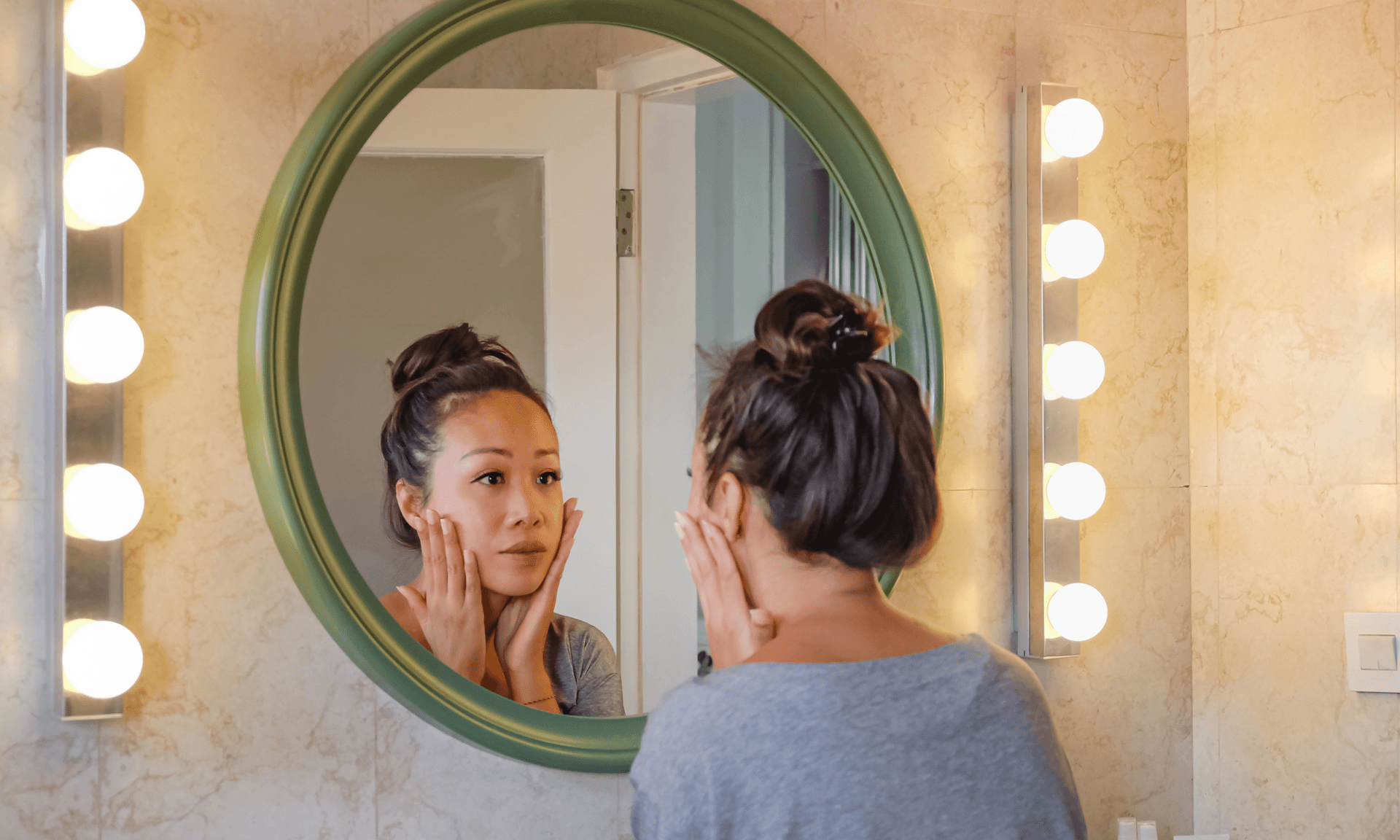 Woman looking in mirror