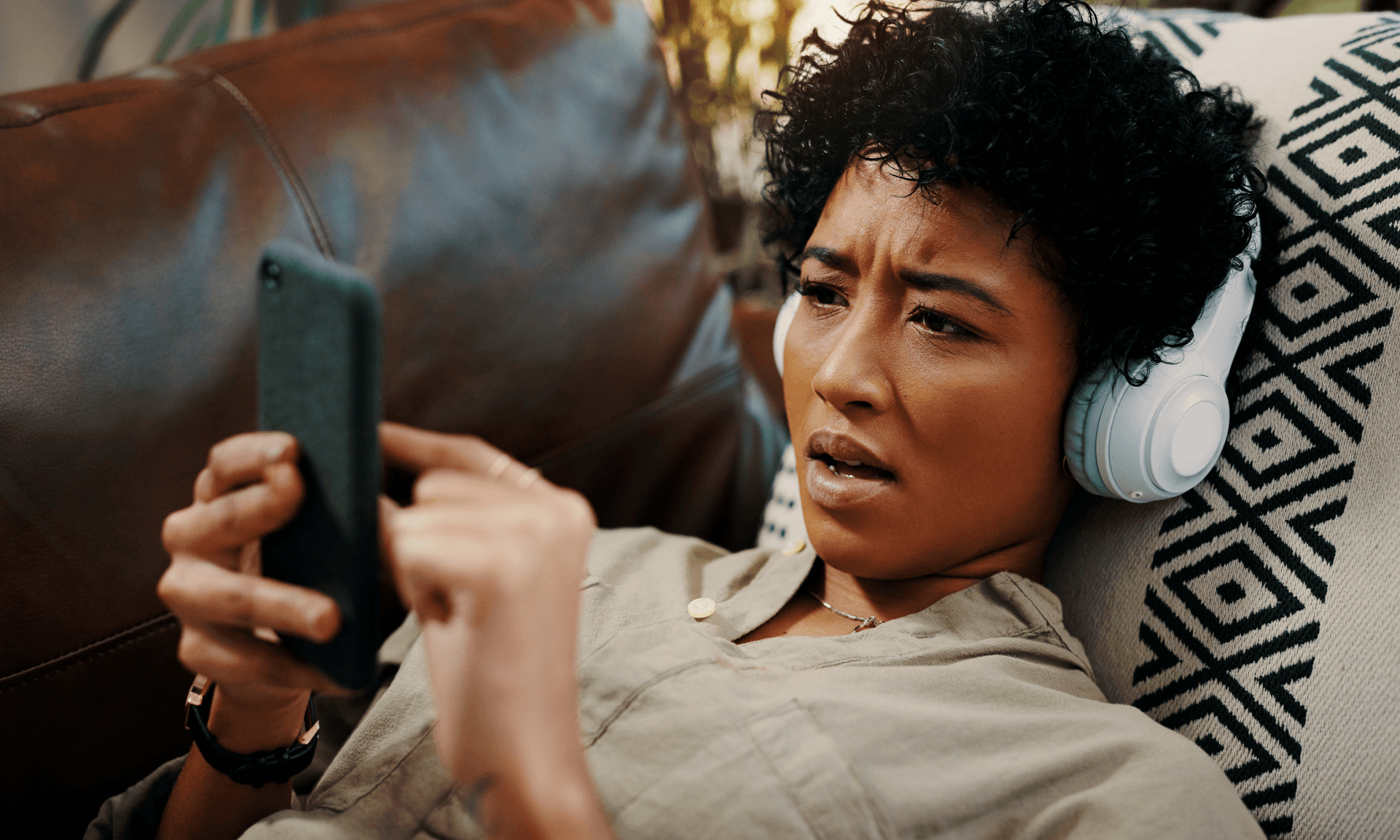 Woman looking confused on phone