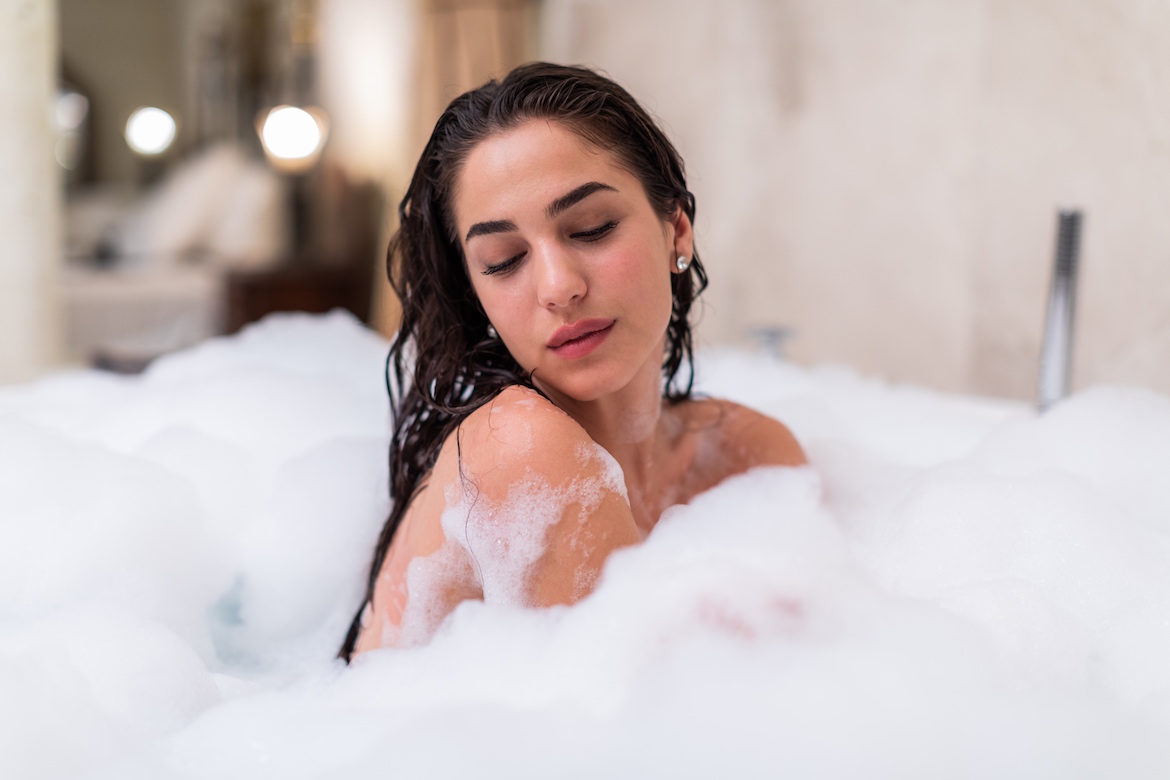 Featured image for Does a Bath *Actually* Get You Clean? A Derm and a Germ Expert Weigh In