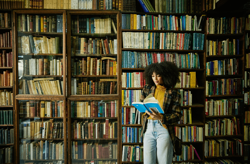 Woman reading in library