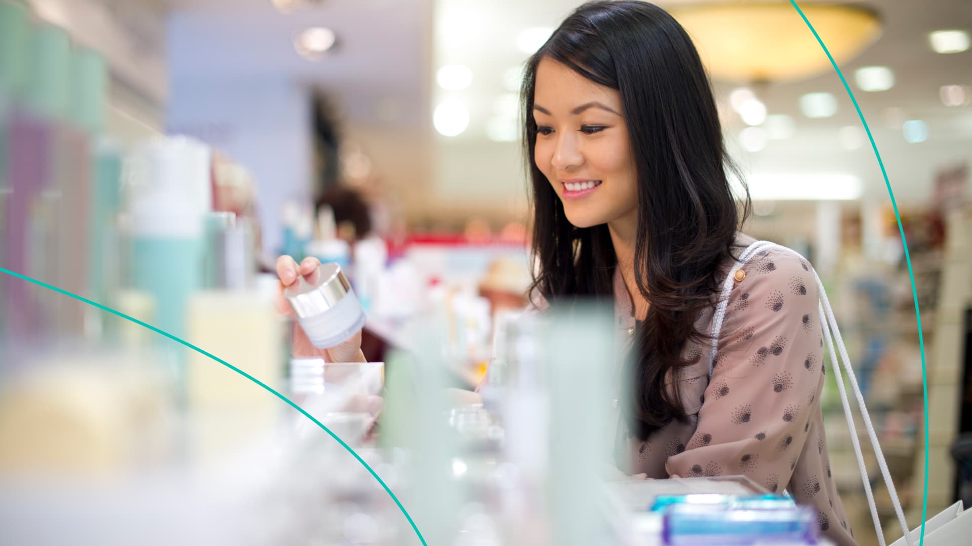 A woman reviews the ingredients in a product