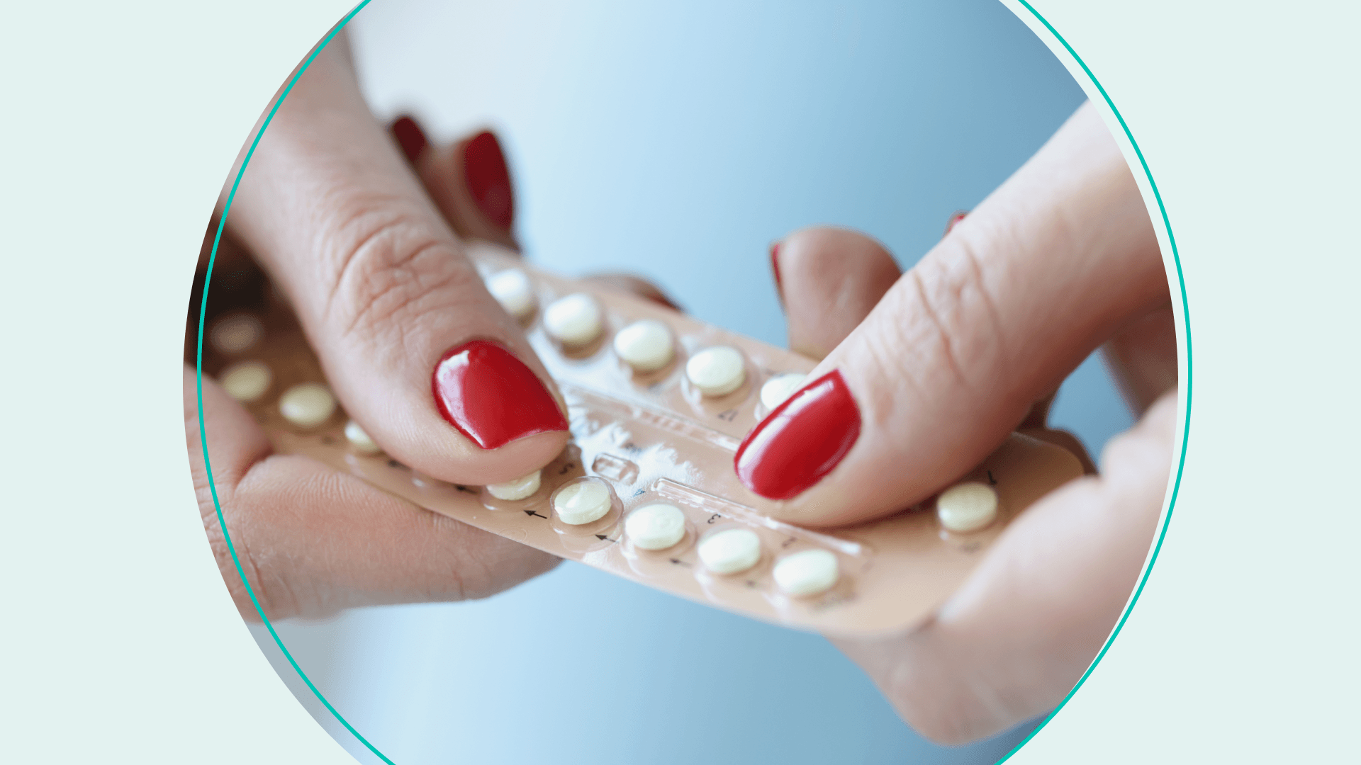 Woman holds pack of hormonal contraceptive birth control