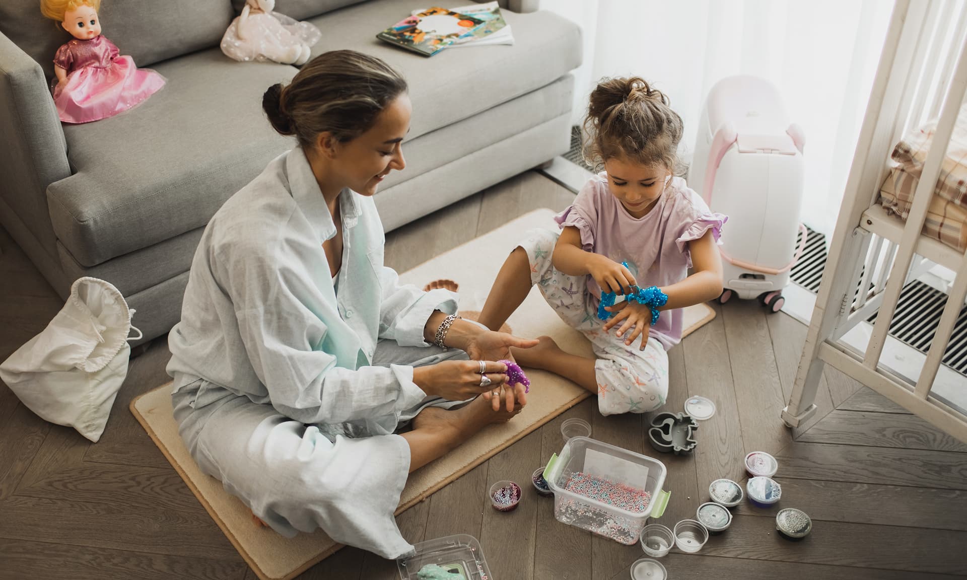 Woman babysitting playing with child