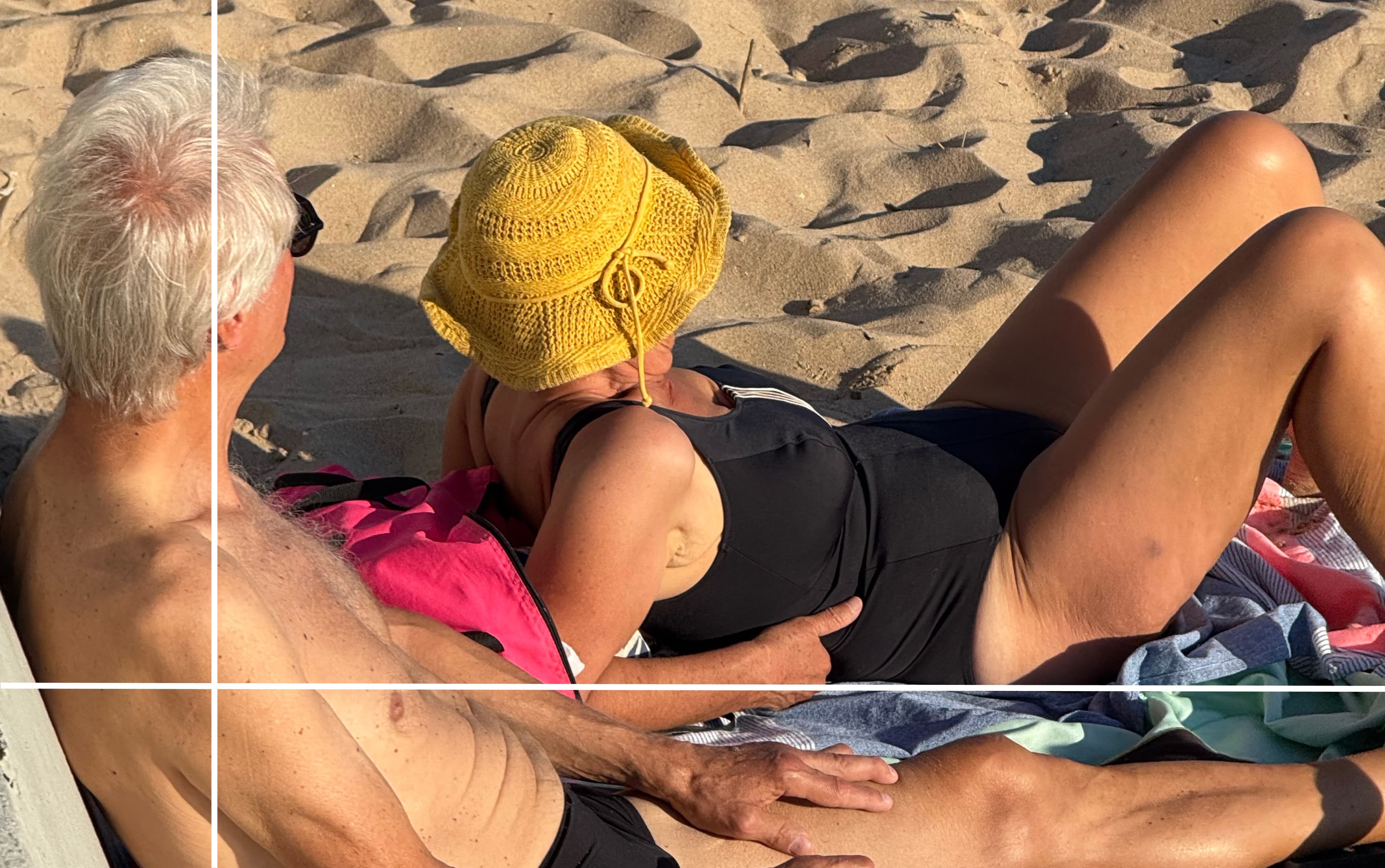 two older people on beach