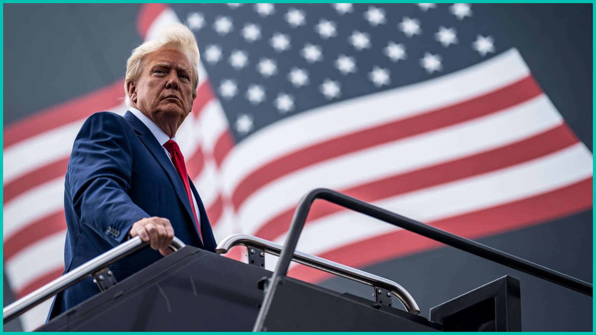 President Trump walking up a podiu