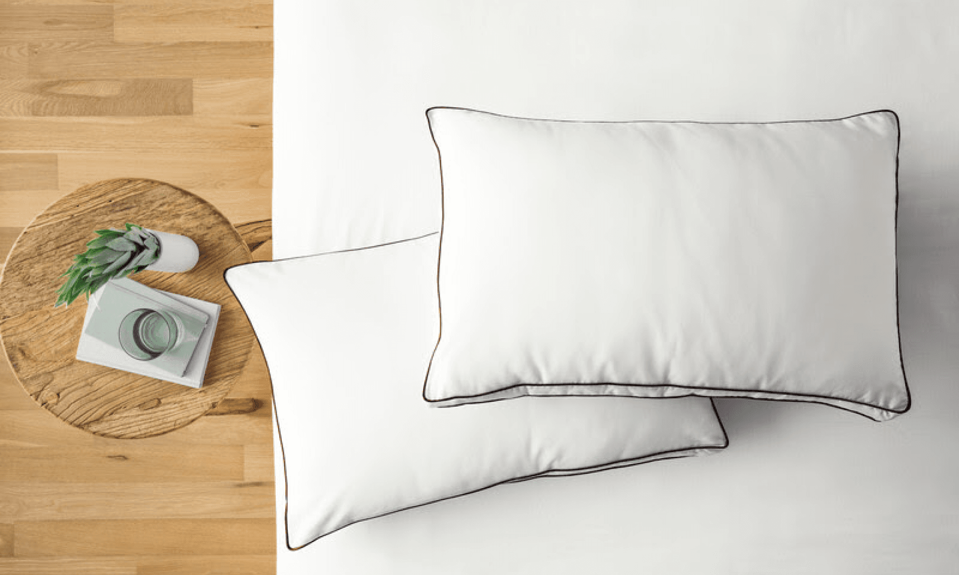 Saatva pillows on a white bed