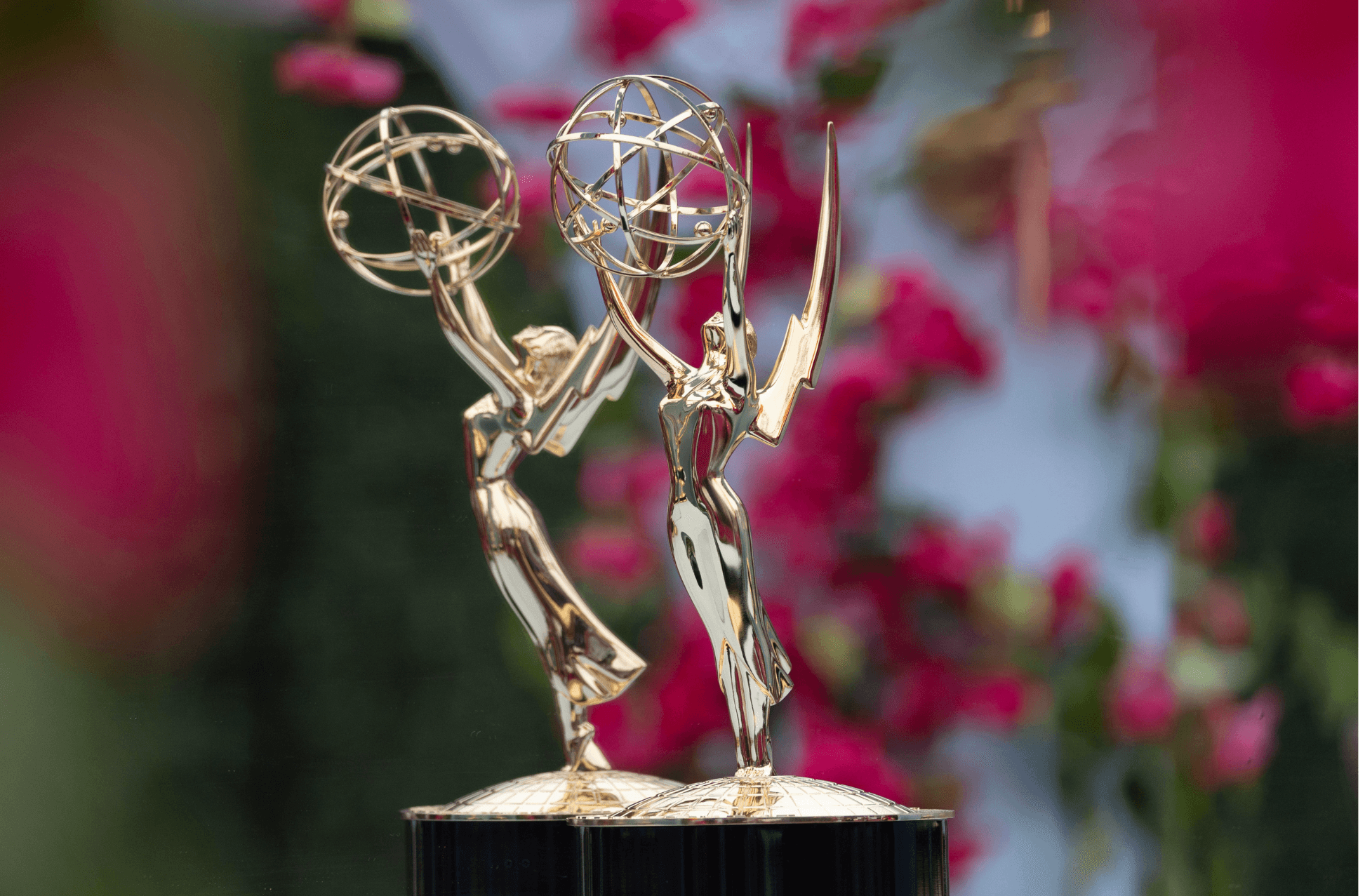 two emmy awards side by side