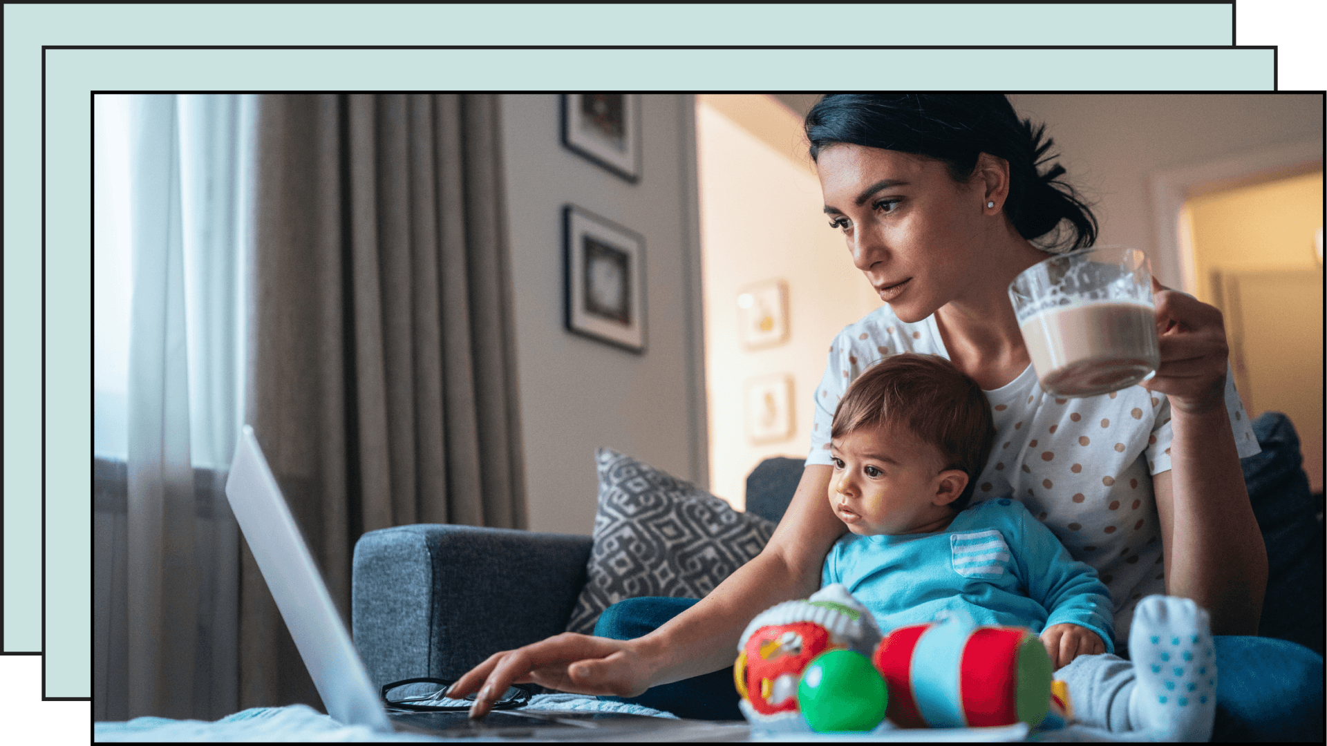 mom and baby looking at computer