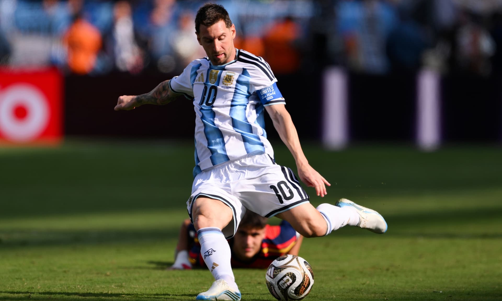 Messi kicking ball