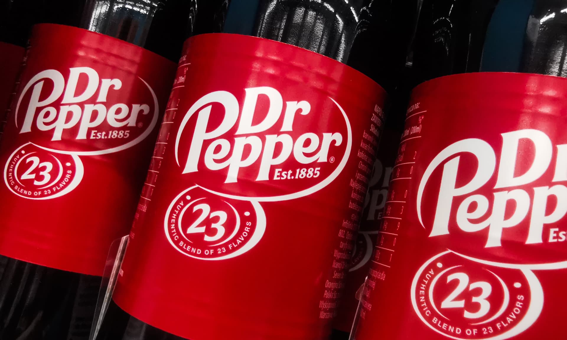 Dr. Pepper bottles on a store shelf