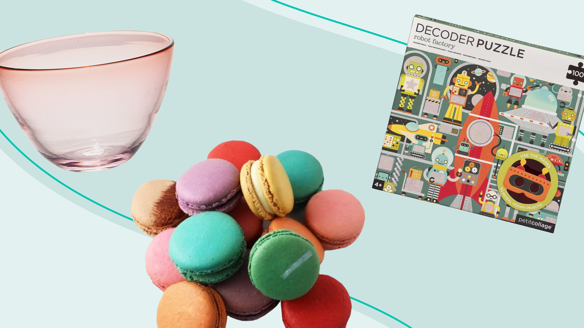 glass bowl, macarons, and puzzle floating on teal background