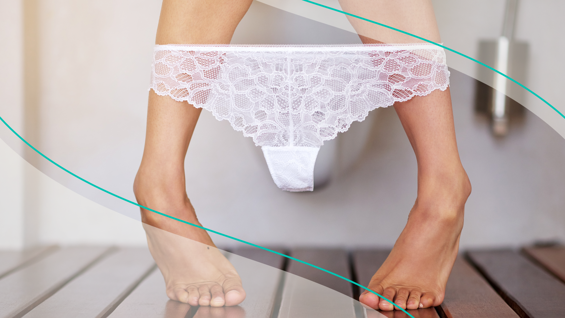 A woman's legs with white lace underwear pulled down to ankles
