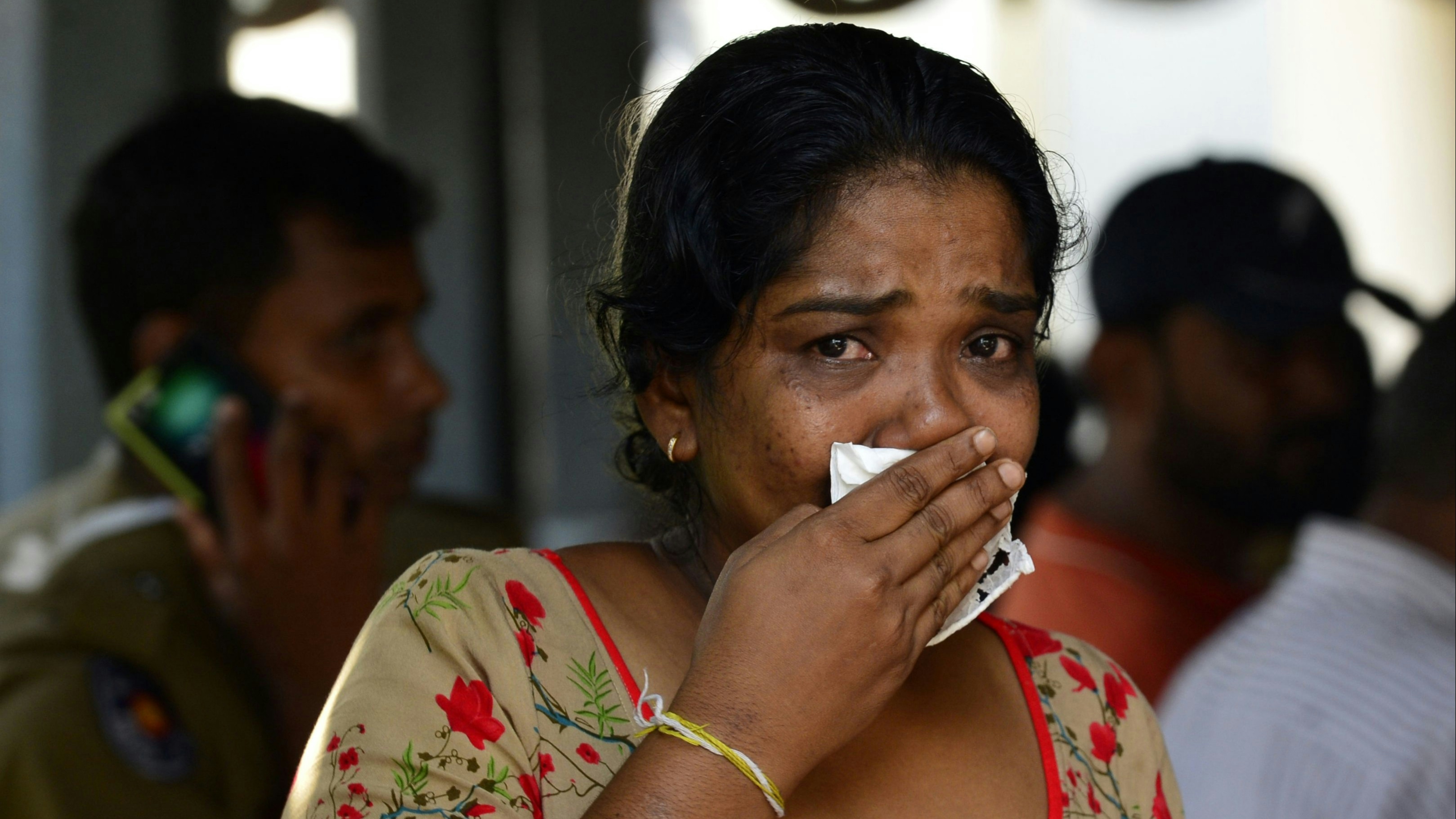 Woman mourning after the Sri Lanka attacks
