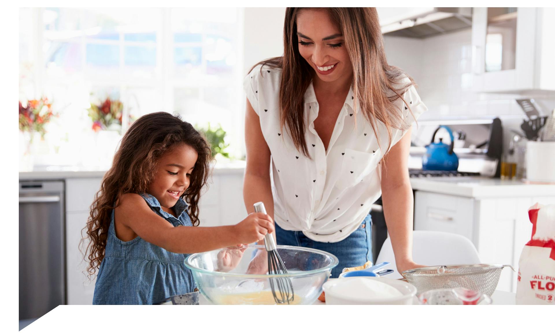 woman in kitchen with kid