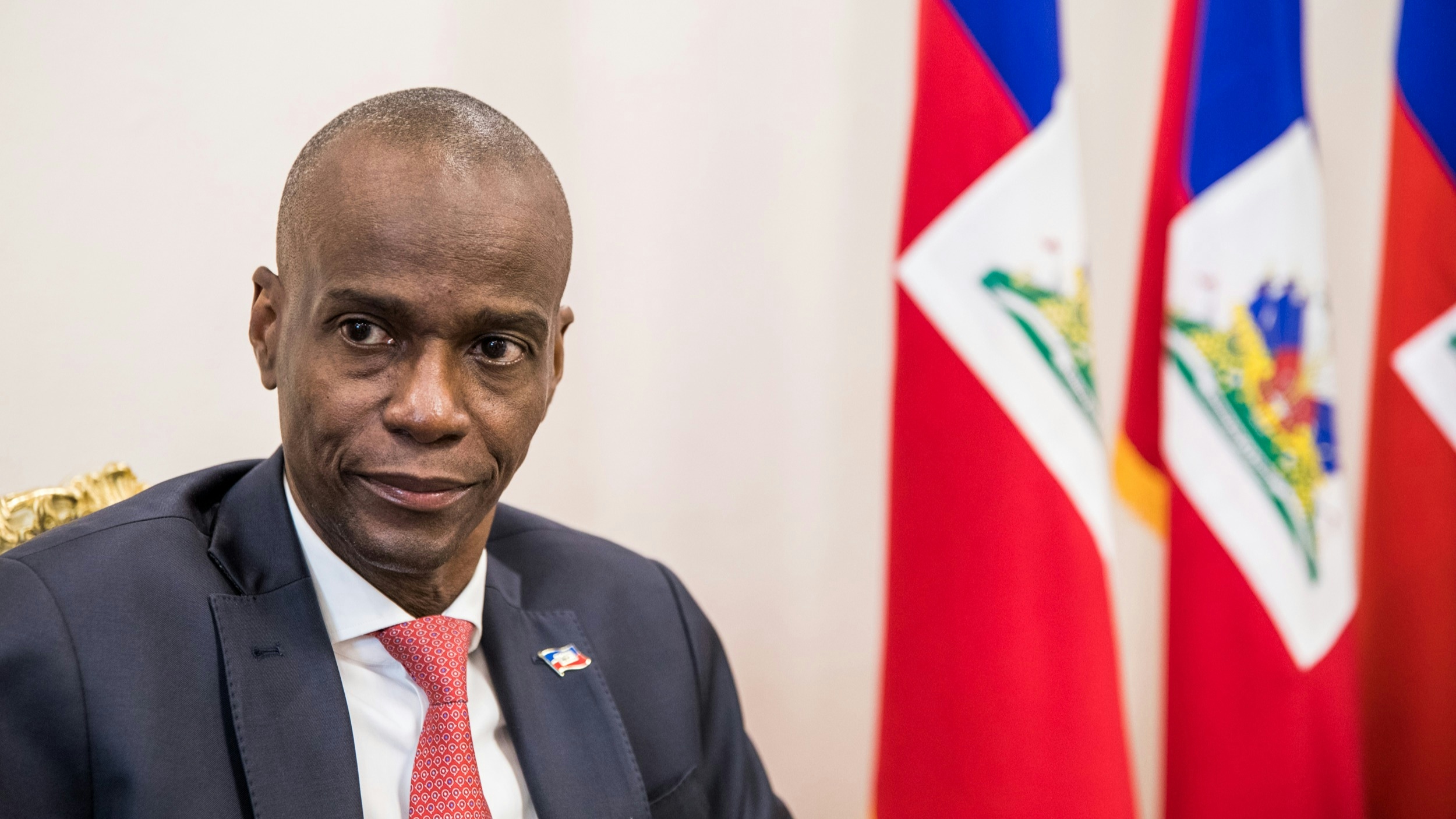 President Jovenel Moise sits at the Presidential Palace