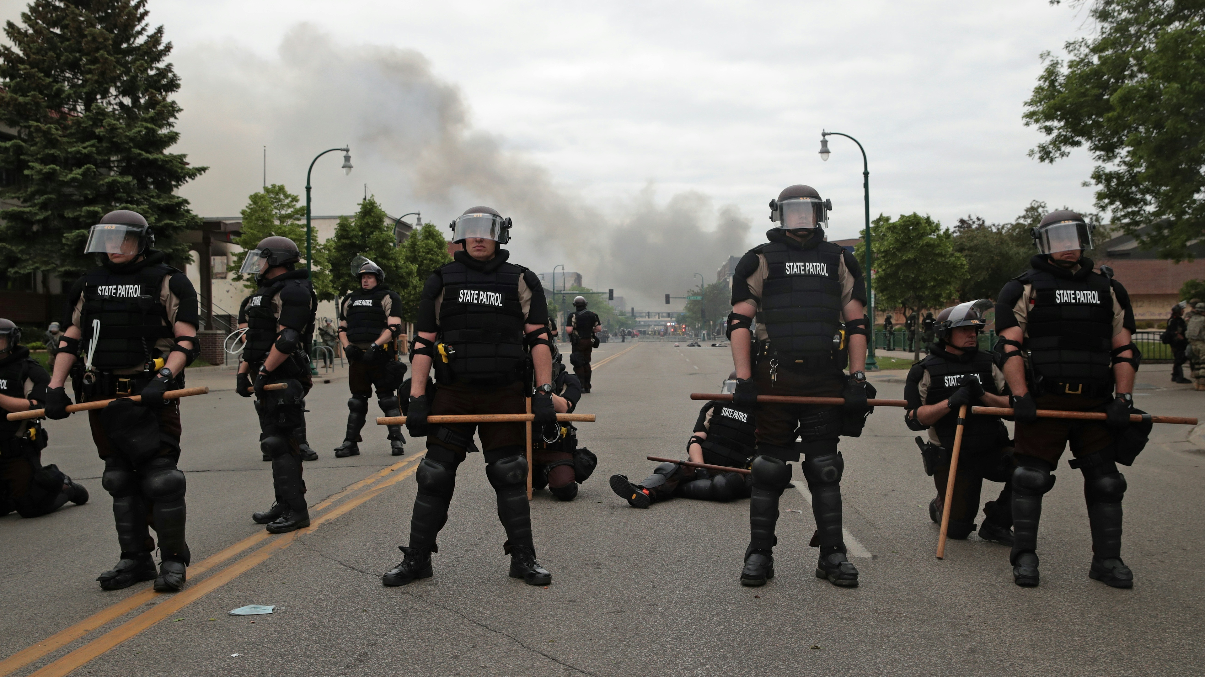 Police officers block a road on the fourth day of protests on May 29, 2020 in Minneapolis, Minnesota.
