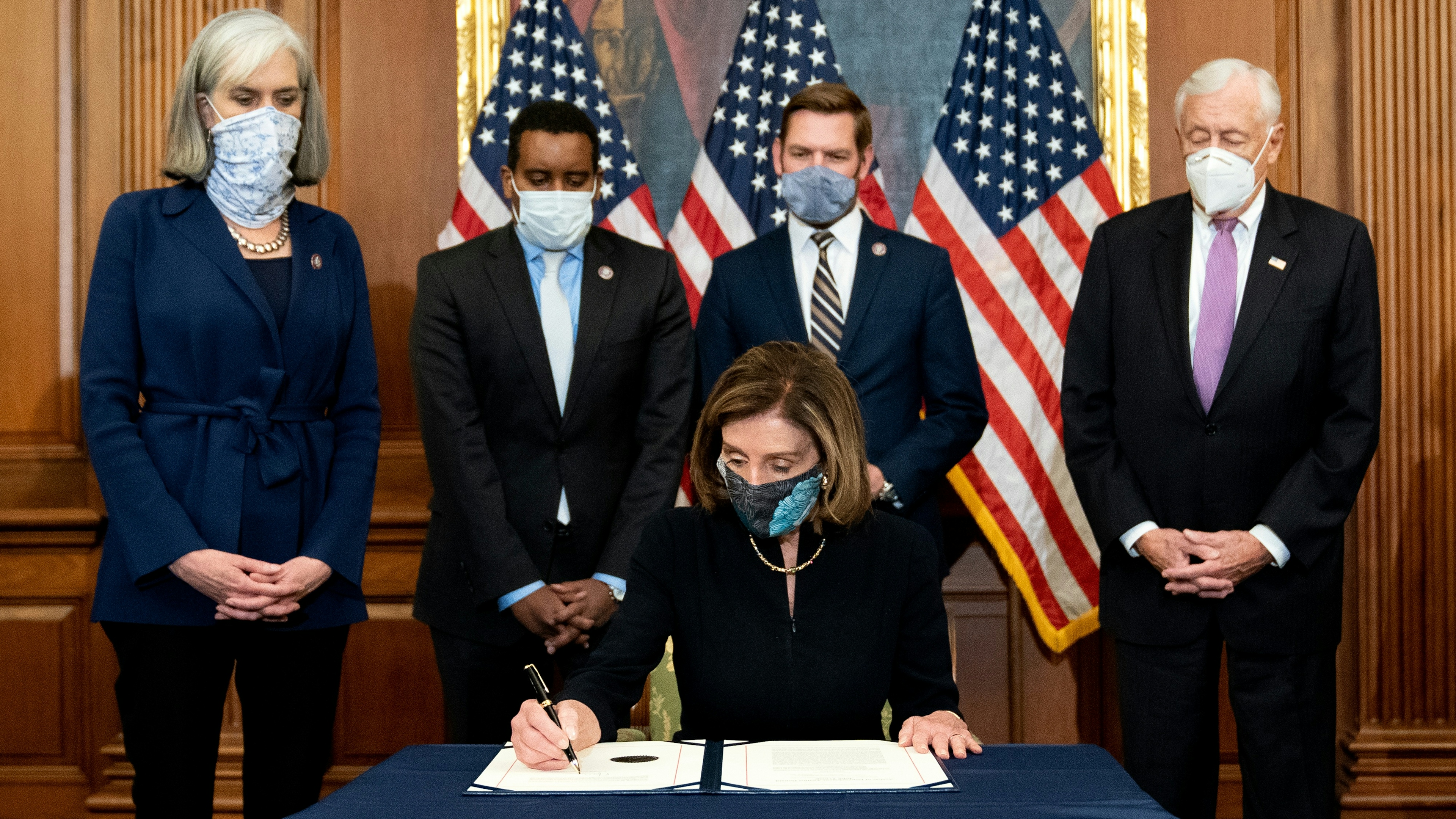 Speaker of the House Nancy Pelosi (D-CA) signs an article of impeachment against President Donald Trump at the U.S. Capitol on January 13, 2021.