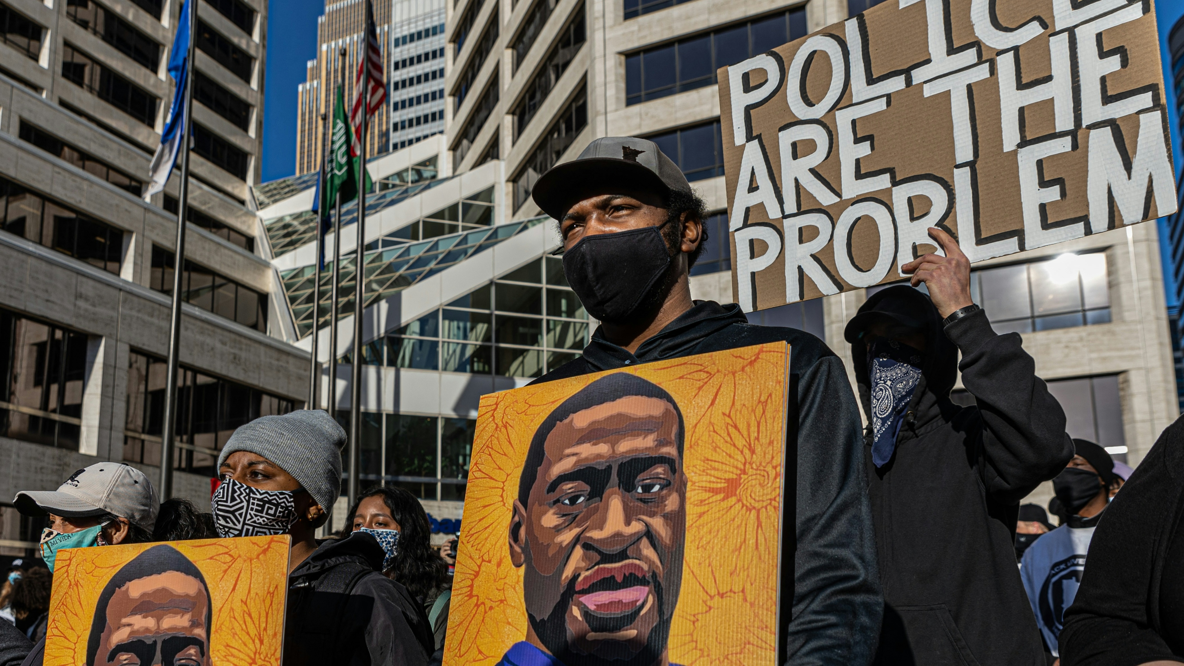 Demonstrators protest outside the Hennepin County Government Center before jury selection begins at the trial of former Minneapolis Police officer Derek Chauvin on March 8, 2021 in Minneapolis, Minnesota.