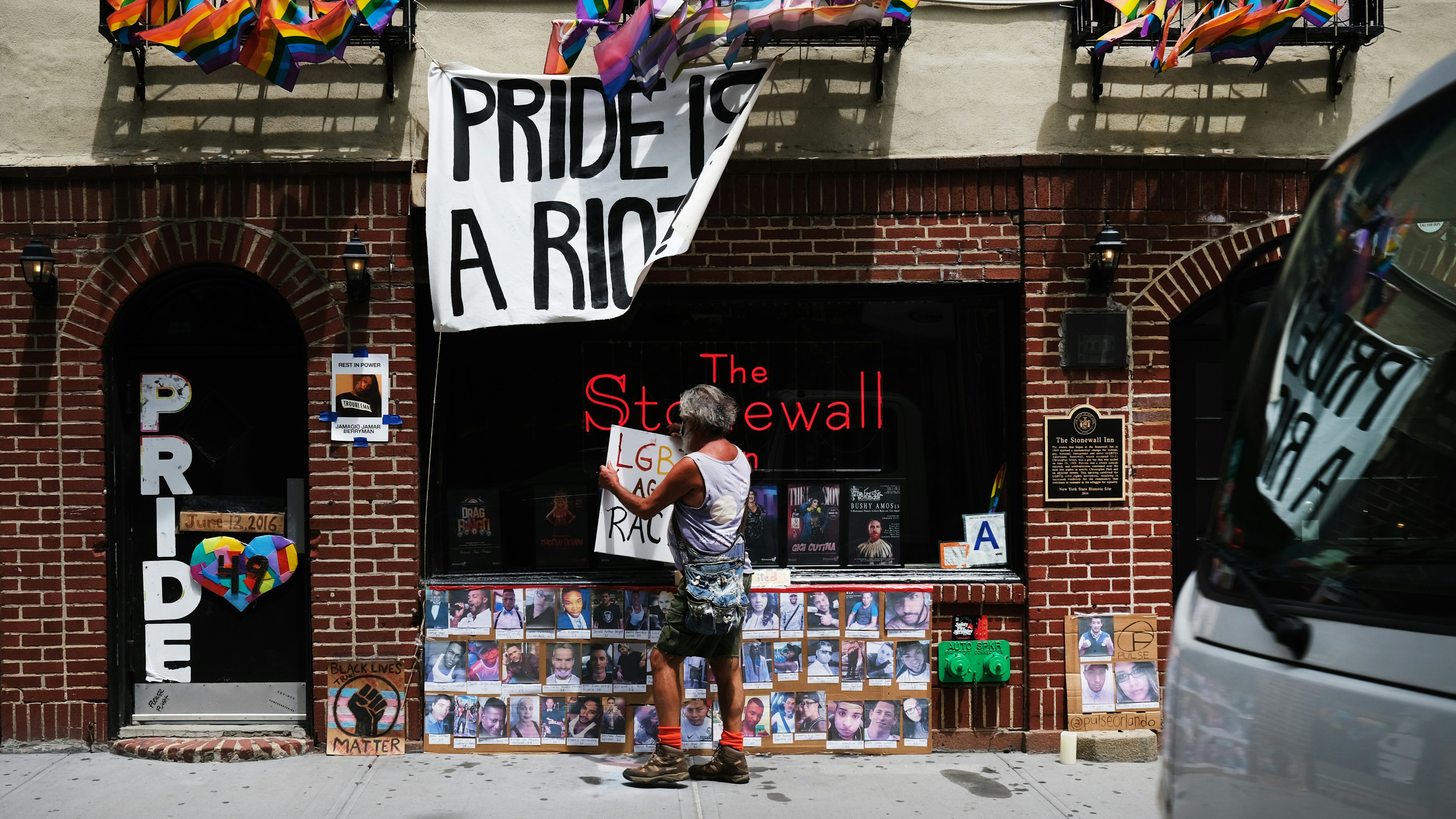A memorial stands outside of the historic LGBT bar The Stonewall Inn to the victims of the Pulse night club shooting in Manhattan's West Village on June 15, 2020 in New York City.