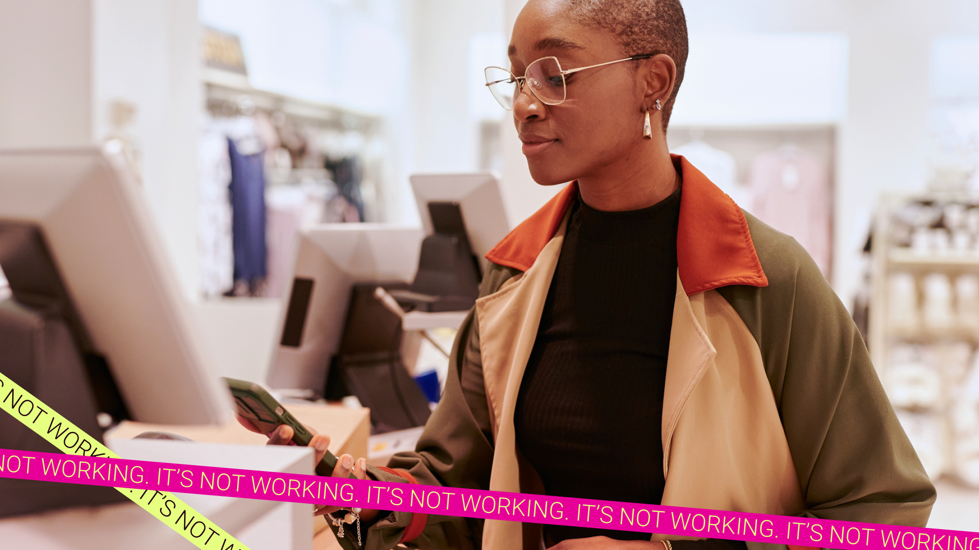 Woman checks her phone while shopping. Tired of being short changed at work and in relationships, women are taking action to secure their finances.