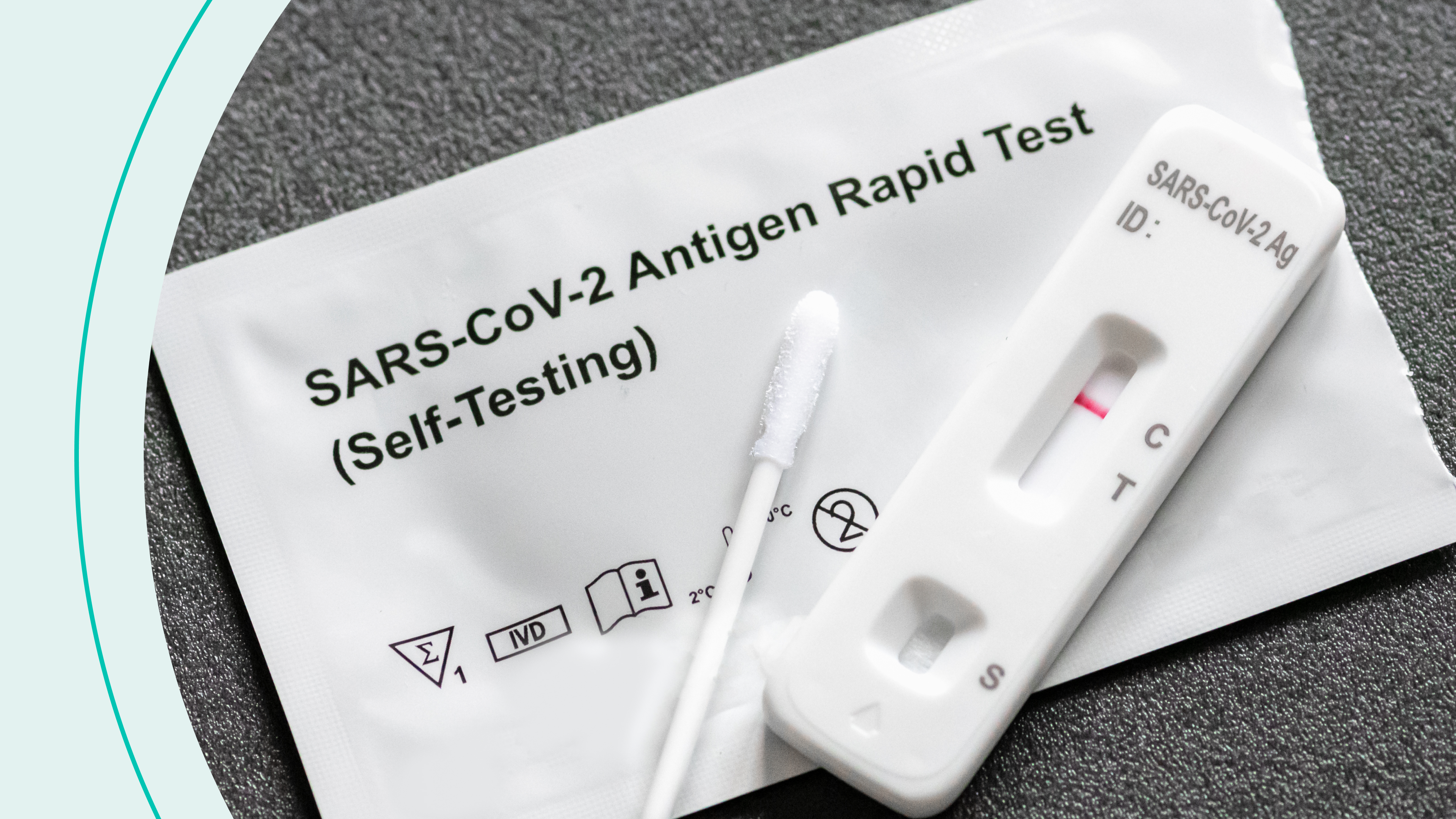 An at-home COVID-19 test and a cotton swab