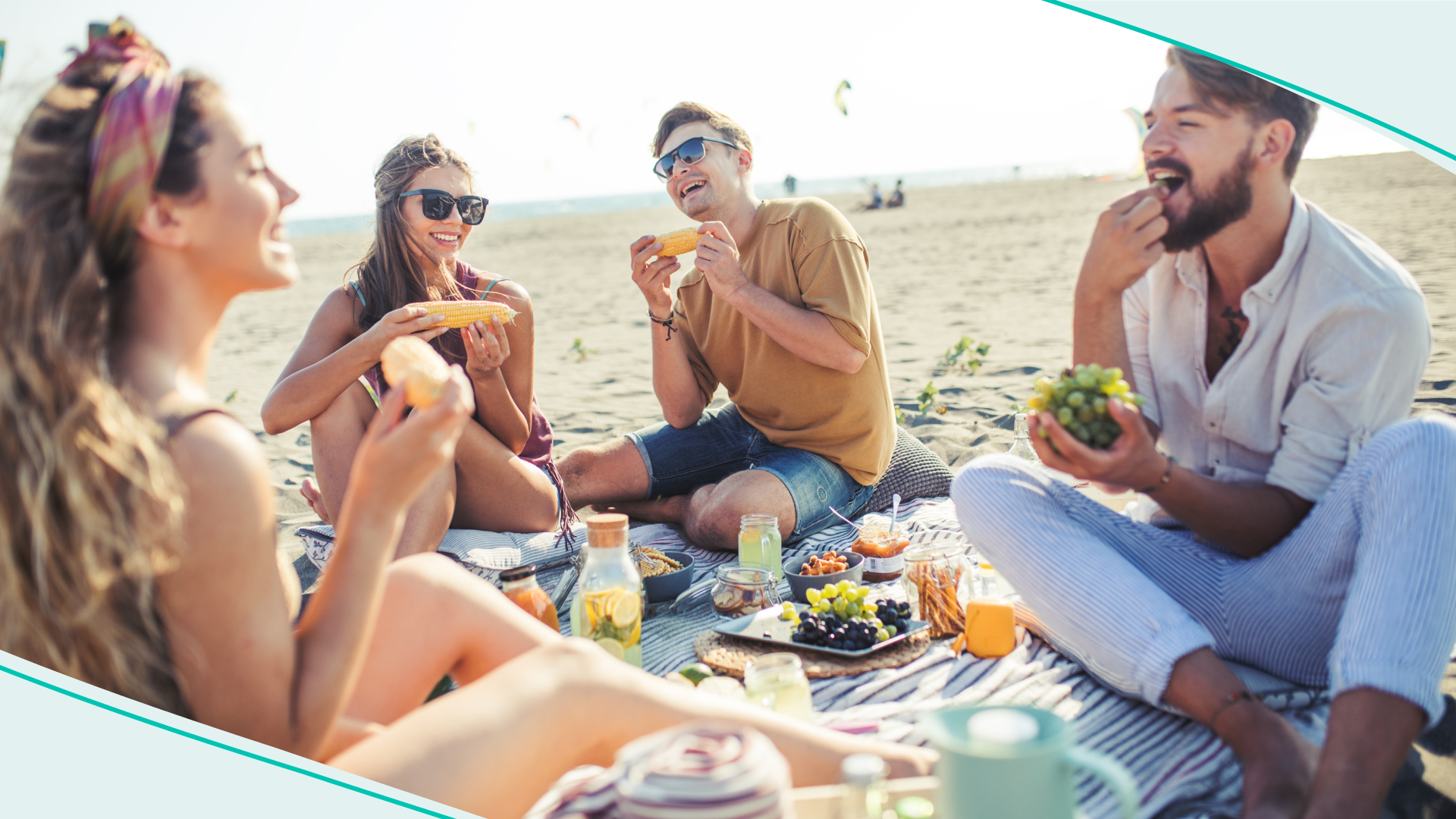 A group of friends enjoying a beach picnic