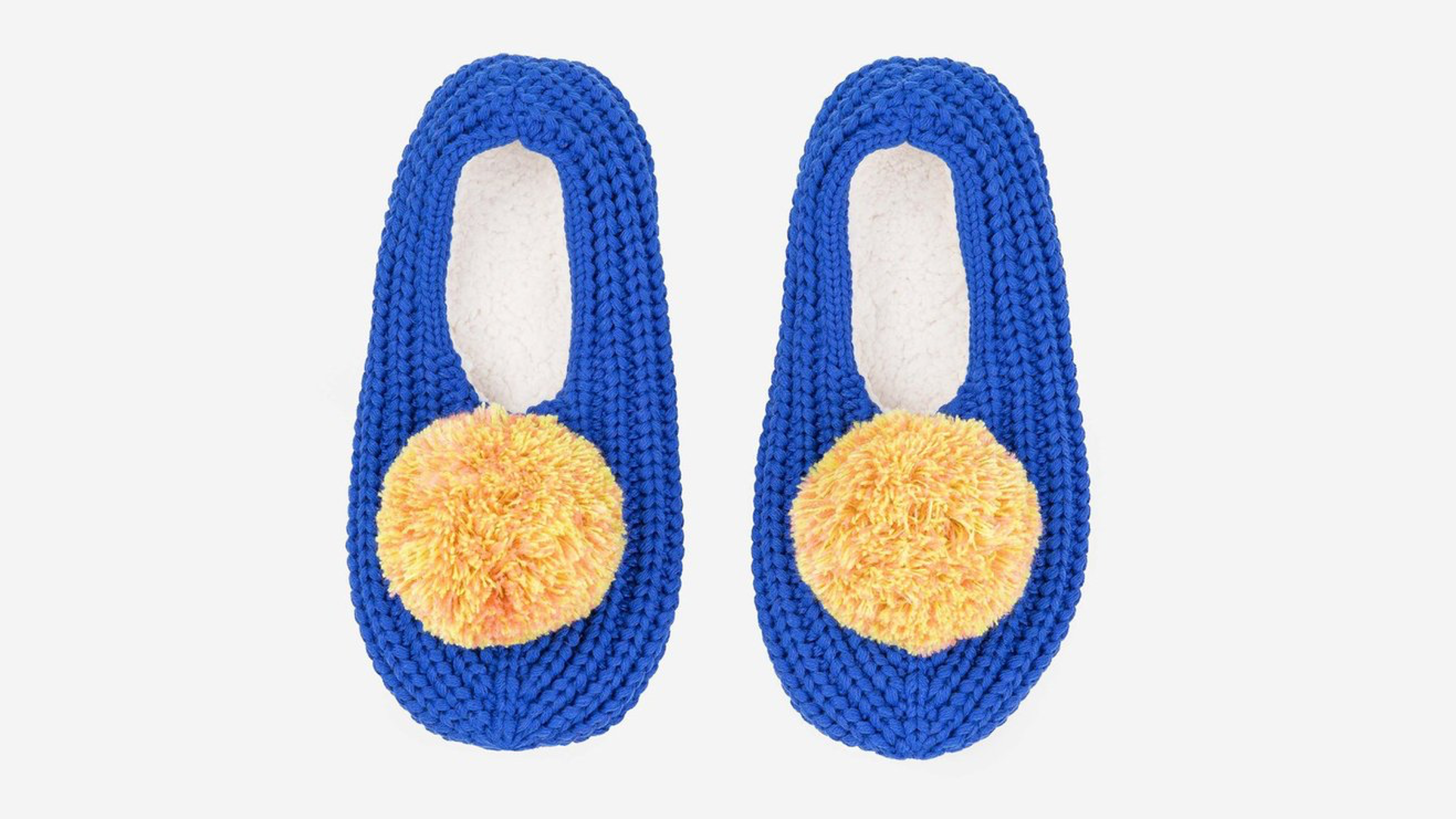 cobalt blue slippers with yellow pom poms on the them