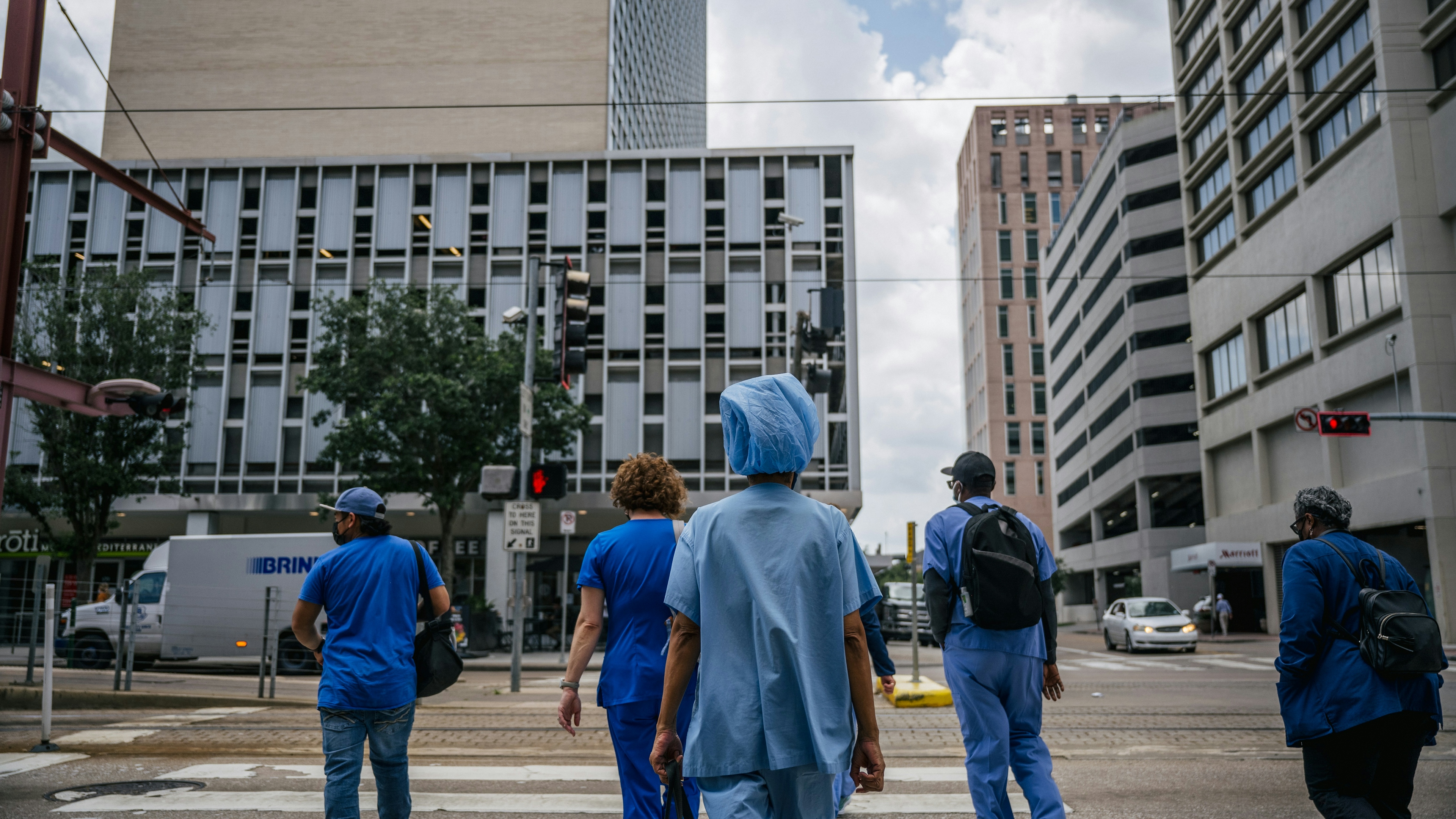 Essential workers in front of Houston Methodist Hospital