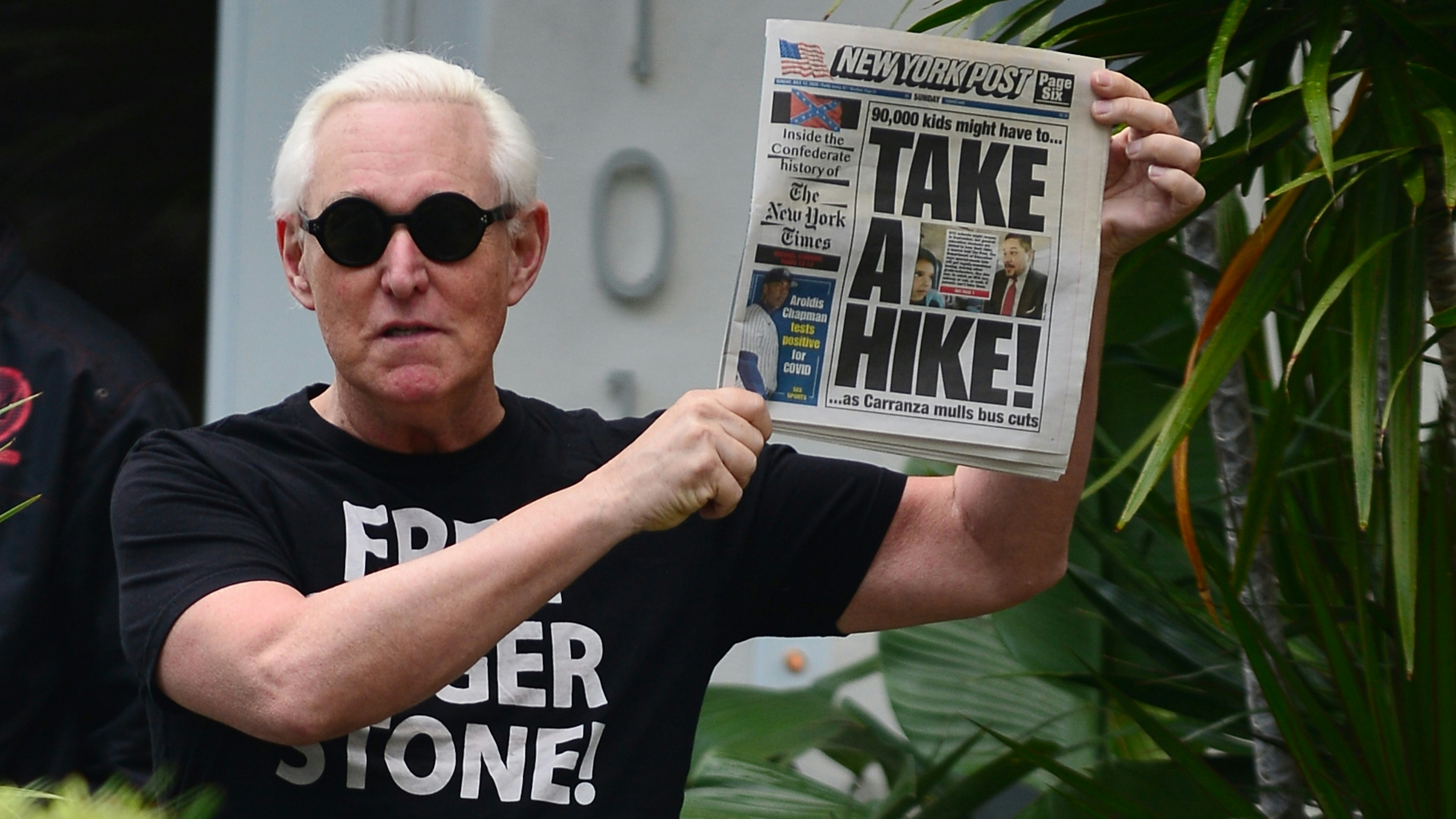Roger Stone makes an appearance outside his house wearing a Free Roger Stone T-Shirt.