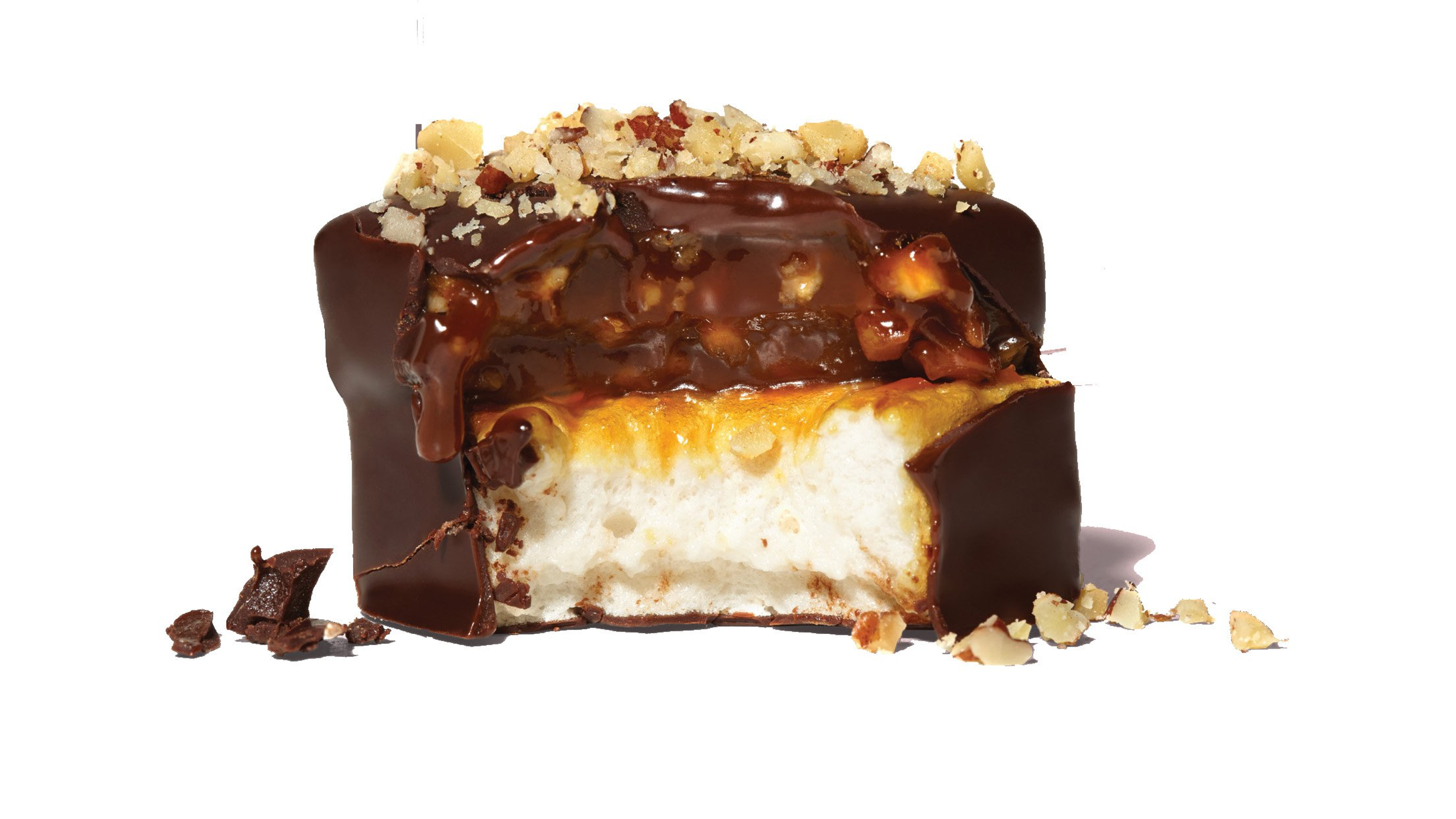 caramel marshmallows covered in chocolate with nuts on top