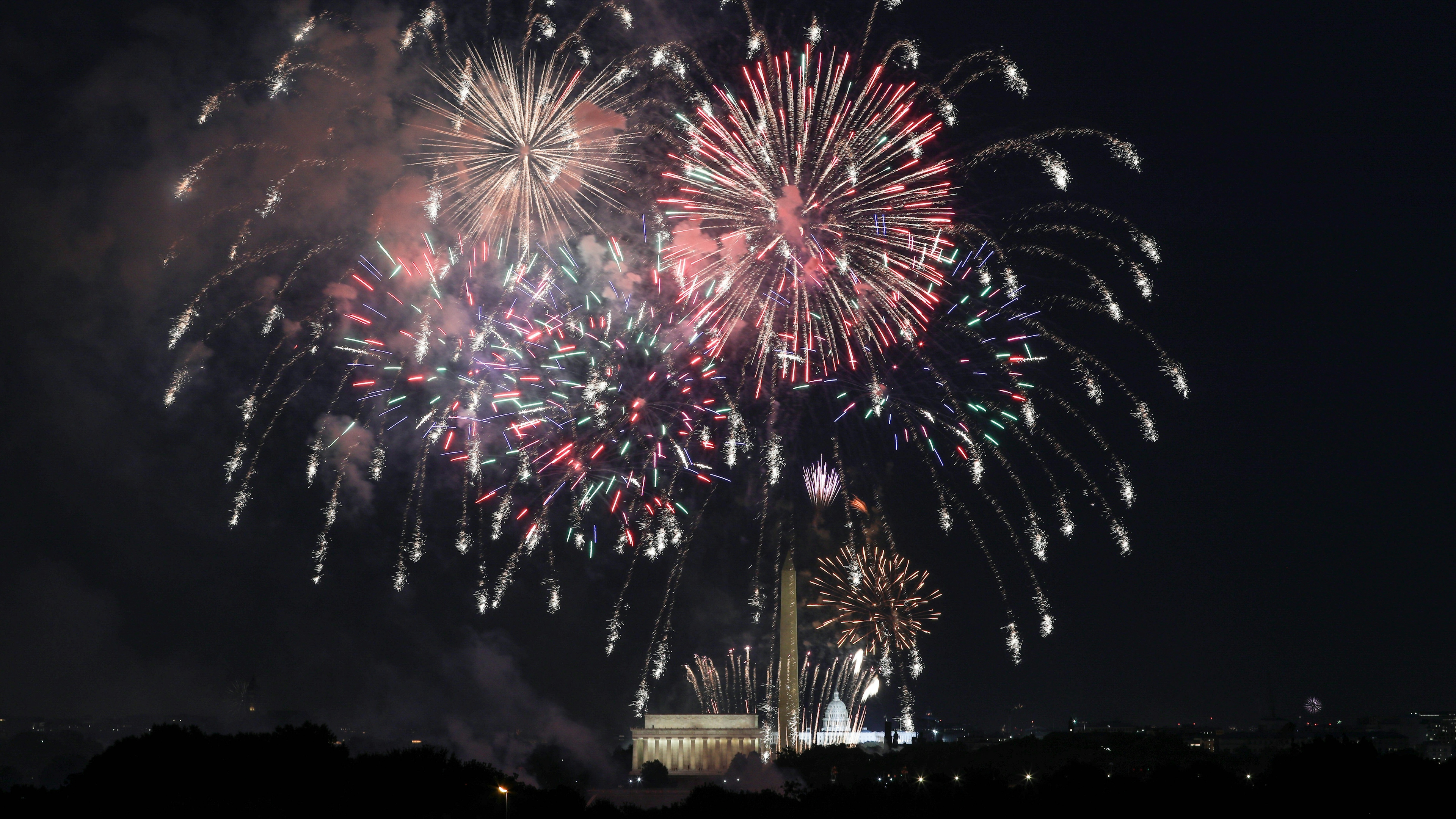Fireworks are set off on the National Mall over the Washington Monument, Lincoln Memorial and US Capitol Building as part of celebrations for Independence Day