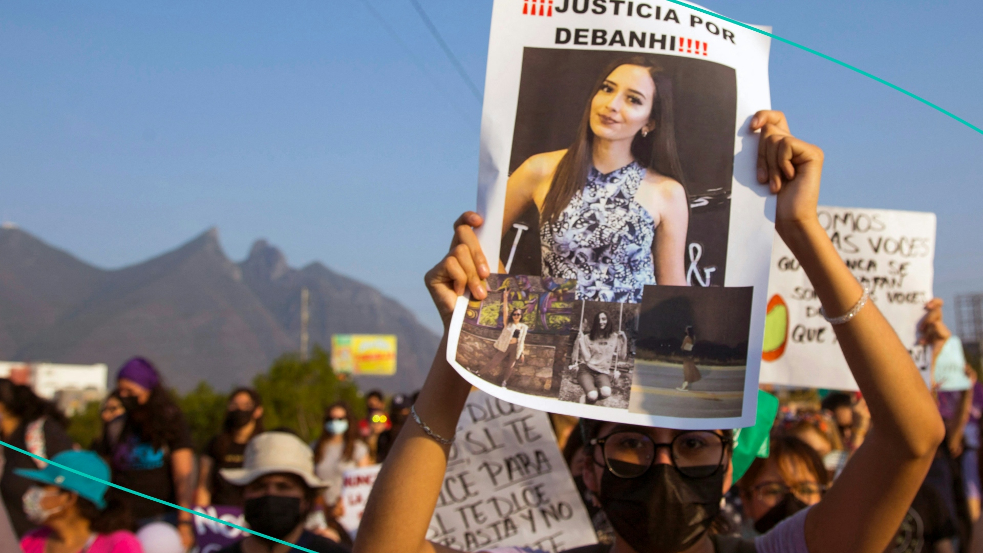A protester holds up a photo of Debanhi Escobar at a demonstration against femicide in Mexico