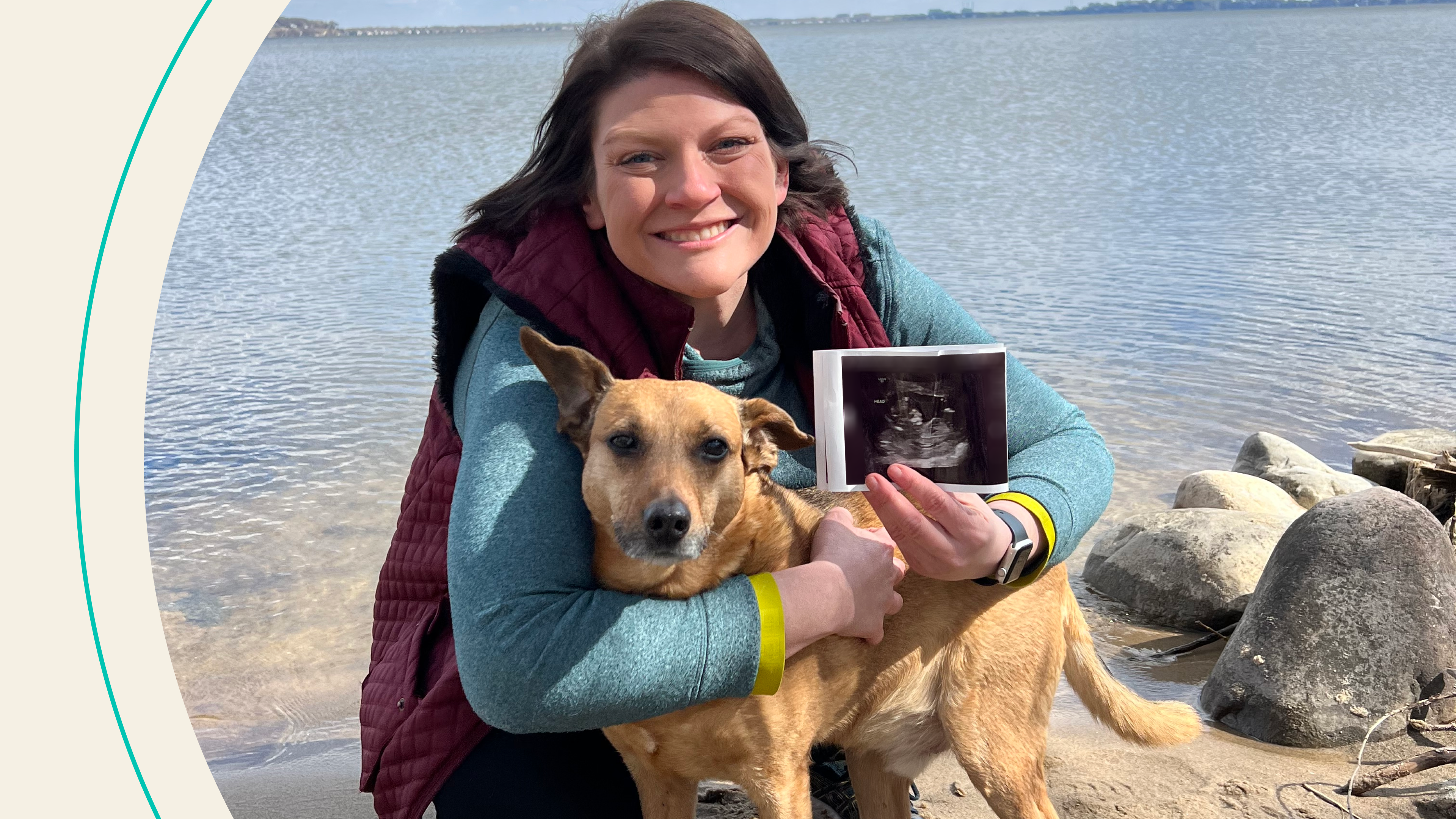 Stephanie Fryer holding her pup, Duncan, and a picture of her ultrasound