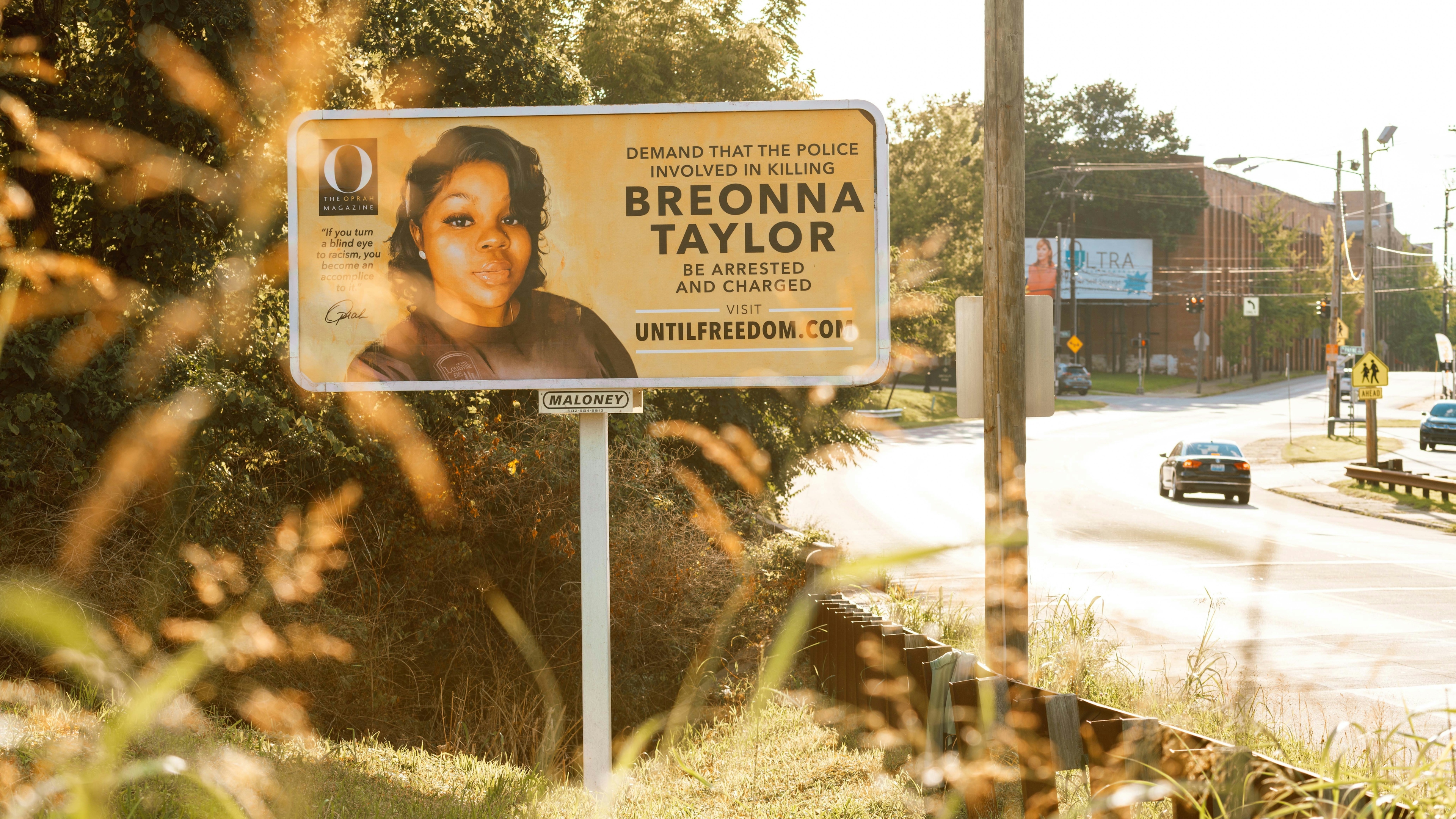 A billboard featuring a picture of Breonna Taylor and calling for the arrest of police officers involved in her death