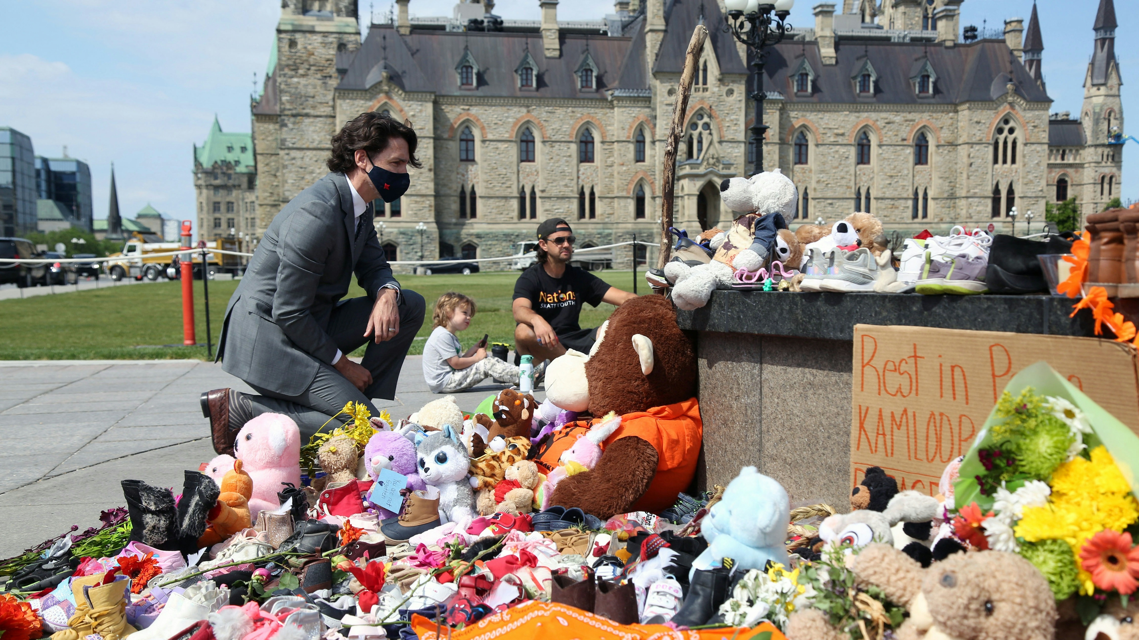 Canadian Prime Minister Justin Trudeau visits the makeshift memorial erected in honor of the 215 indigenous children remains found at a boarding school.