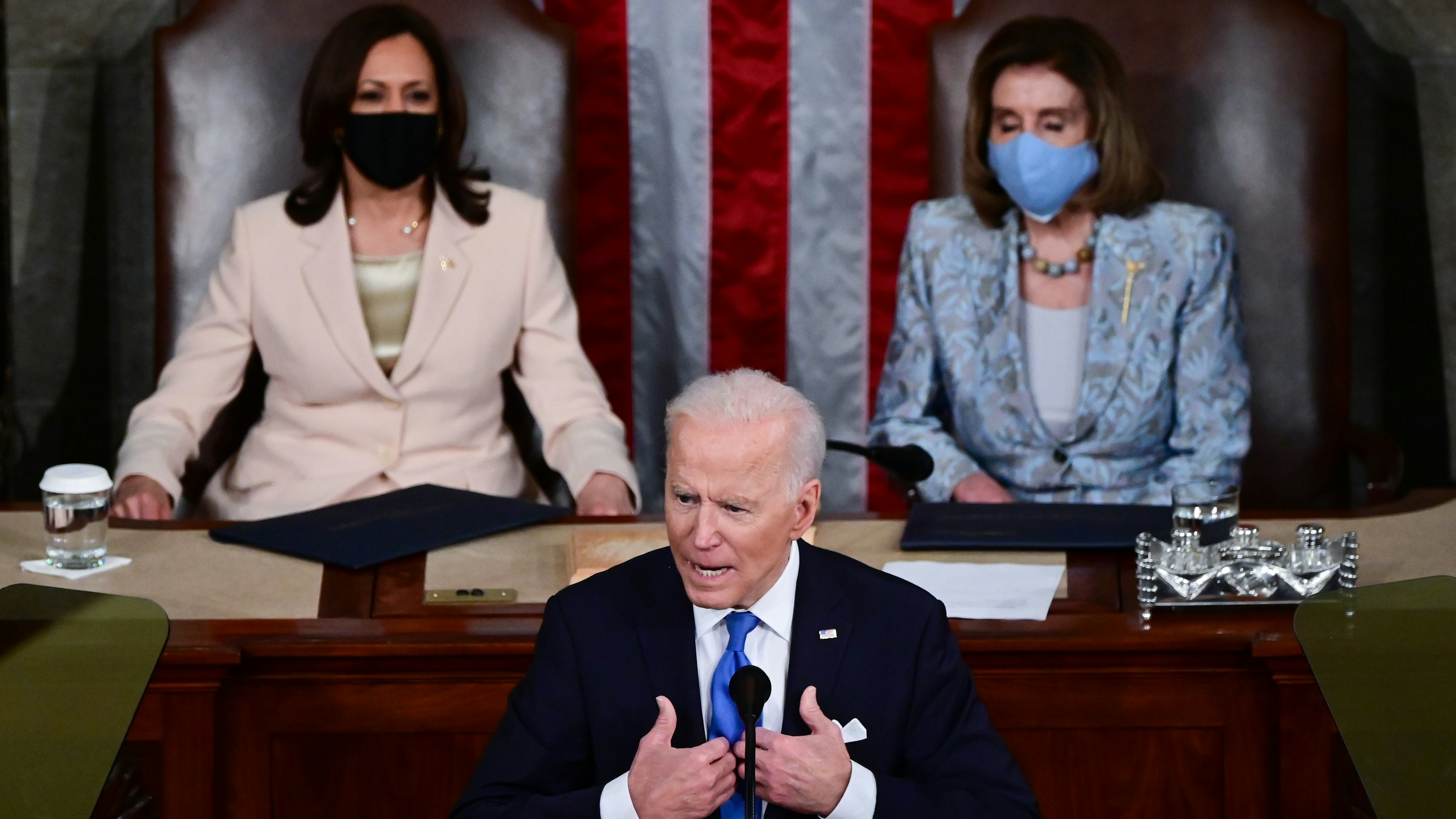 President Joe Biden addresses a joint session of congress as Vice President Kamala Harris (L) and Speaker of the House U.S. Rep. Nancy Pelosi (D-CA) (R) look on in the House chamber of the U.S. Capitol on April 28, 2021 in Washington, DC.