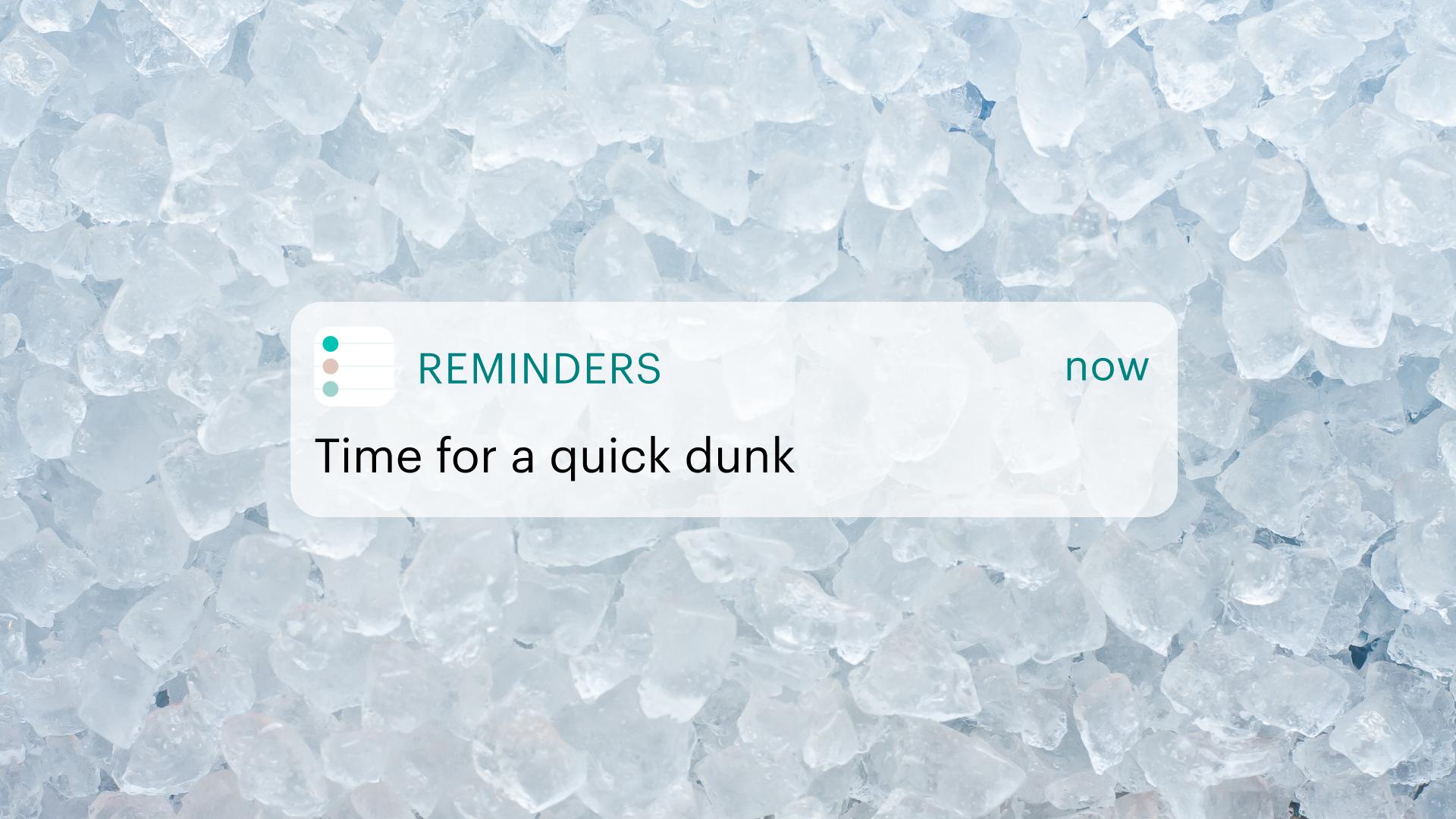 A reminder that says "time for a quick dunk" in front of an image of ice cubes