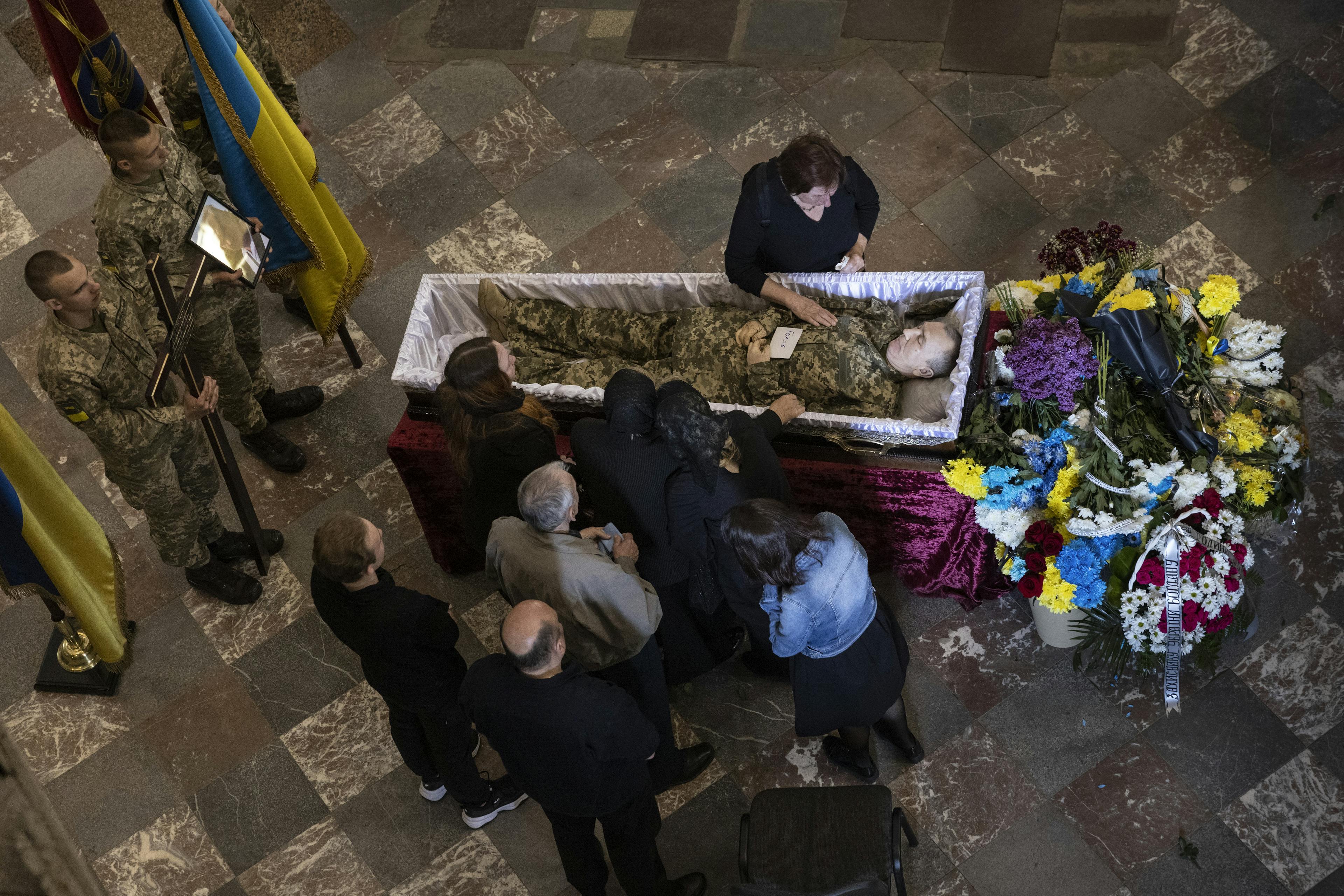 The body of Bogdan Volodymyrovych Holyb, 52, killed in the Luhansk region on May 15. Photo: © 2022 PAULA BRONSTEIN