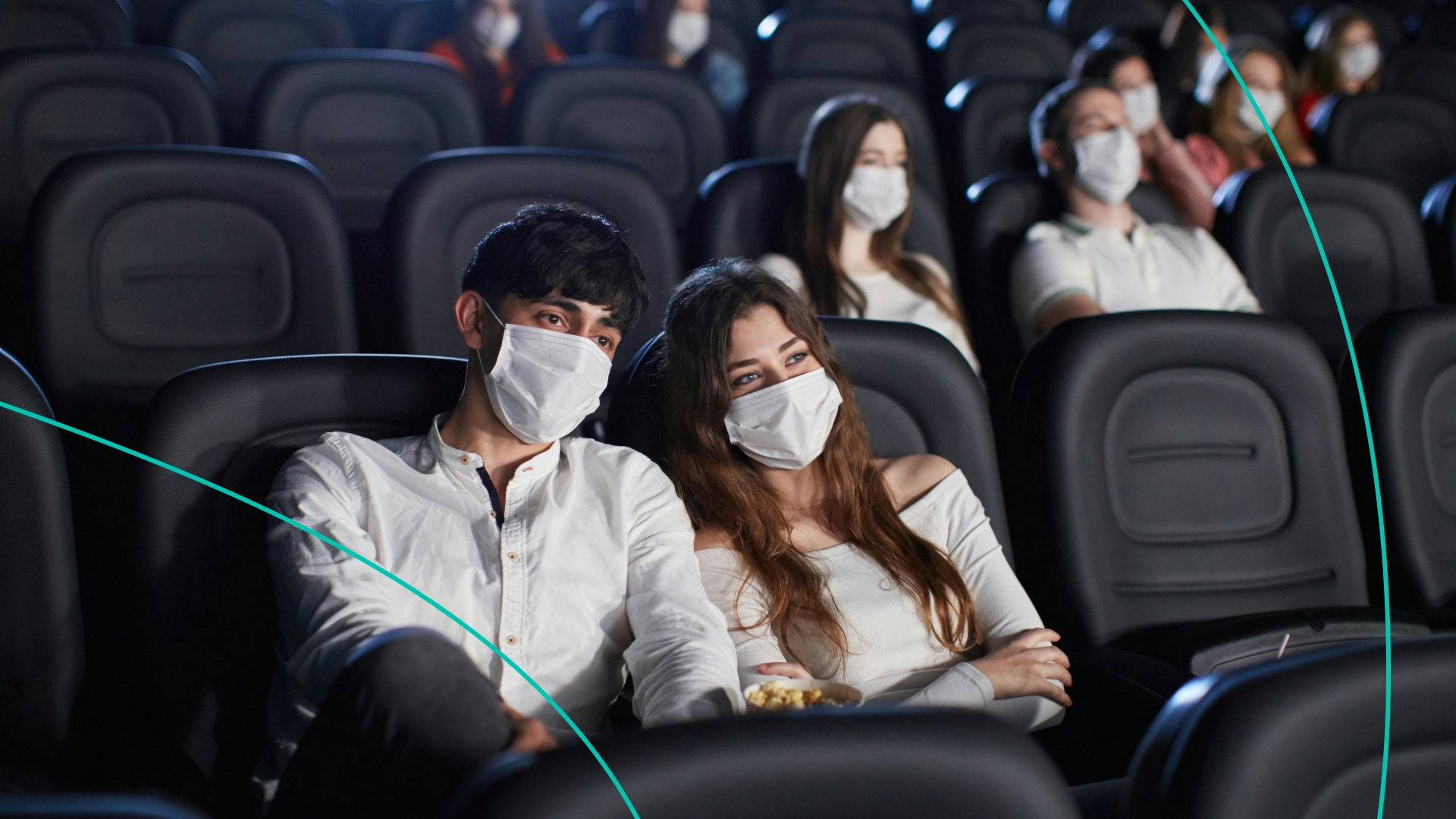 Couple sitting together in the movie theater