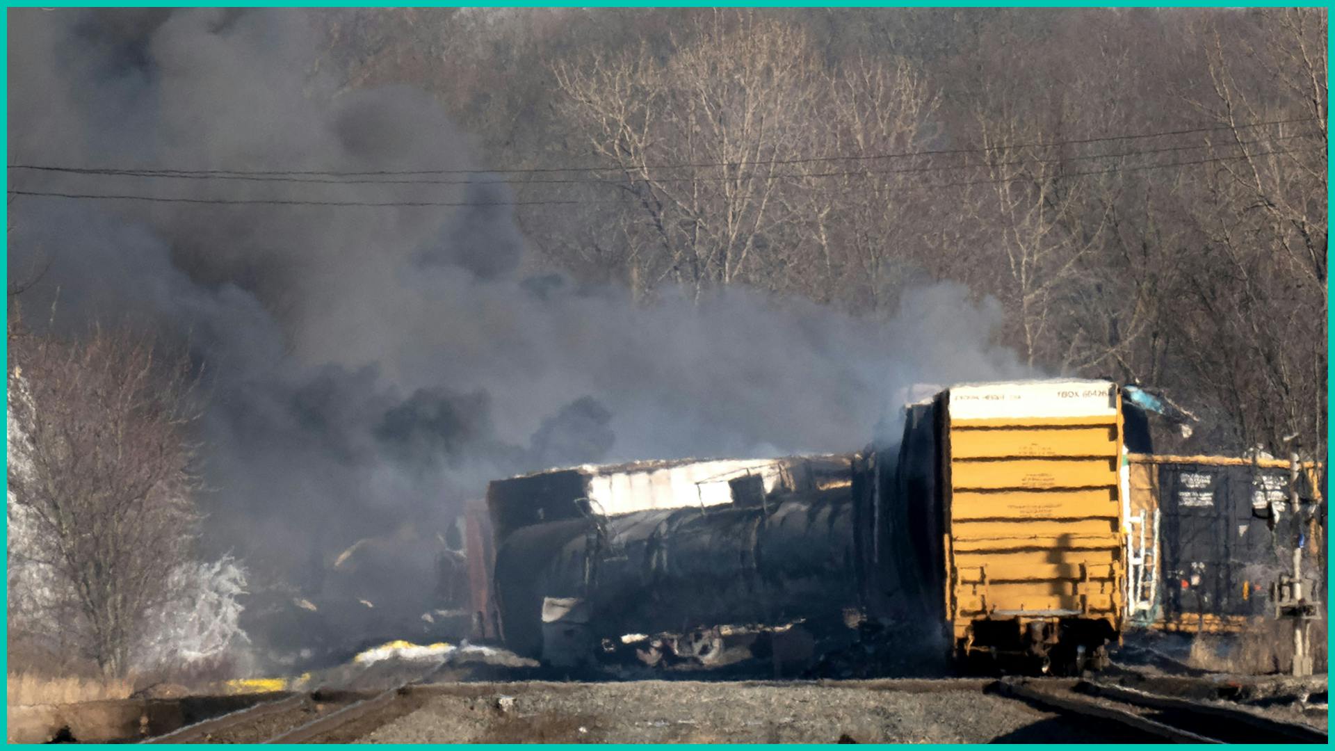 Smoke rises from a derailed cargo train in East Palestine, Ohio, on February 4, 2023.