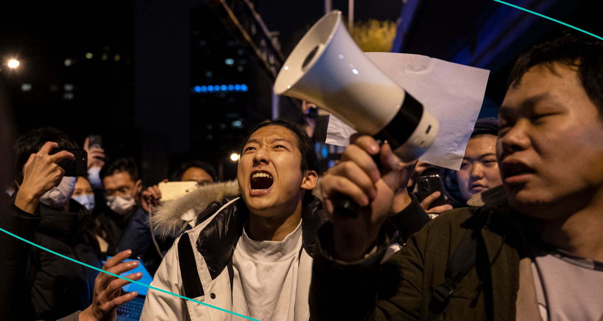 Protesters shout slogans during a protest against Chinas strict zero COVID measures on November 28, 2022 in Beijing, China. 