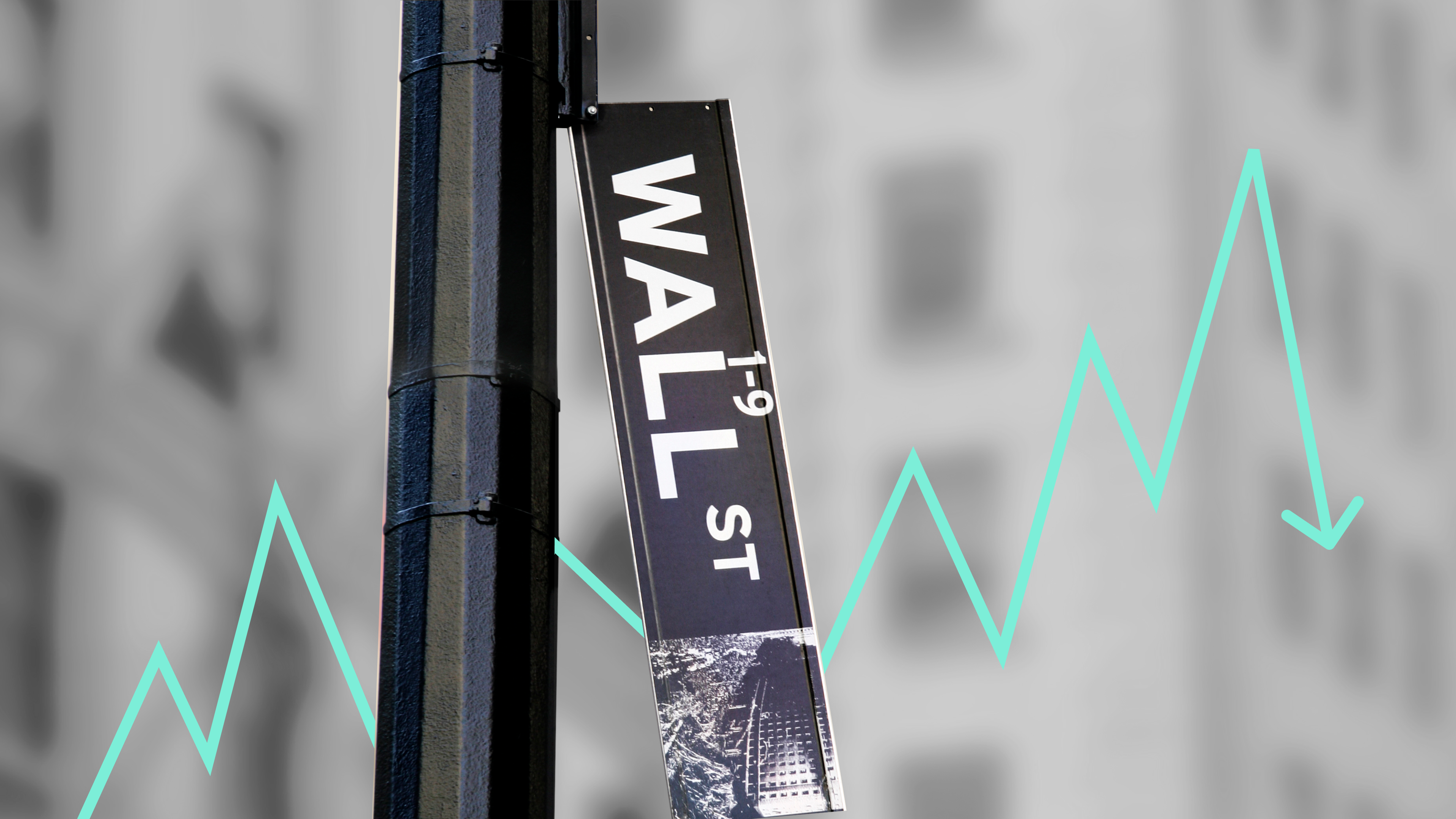 A broken Wall Street sign with a line graph