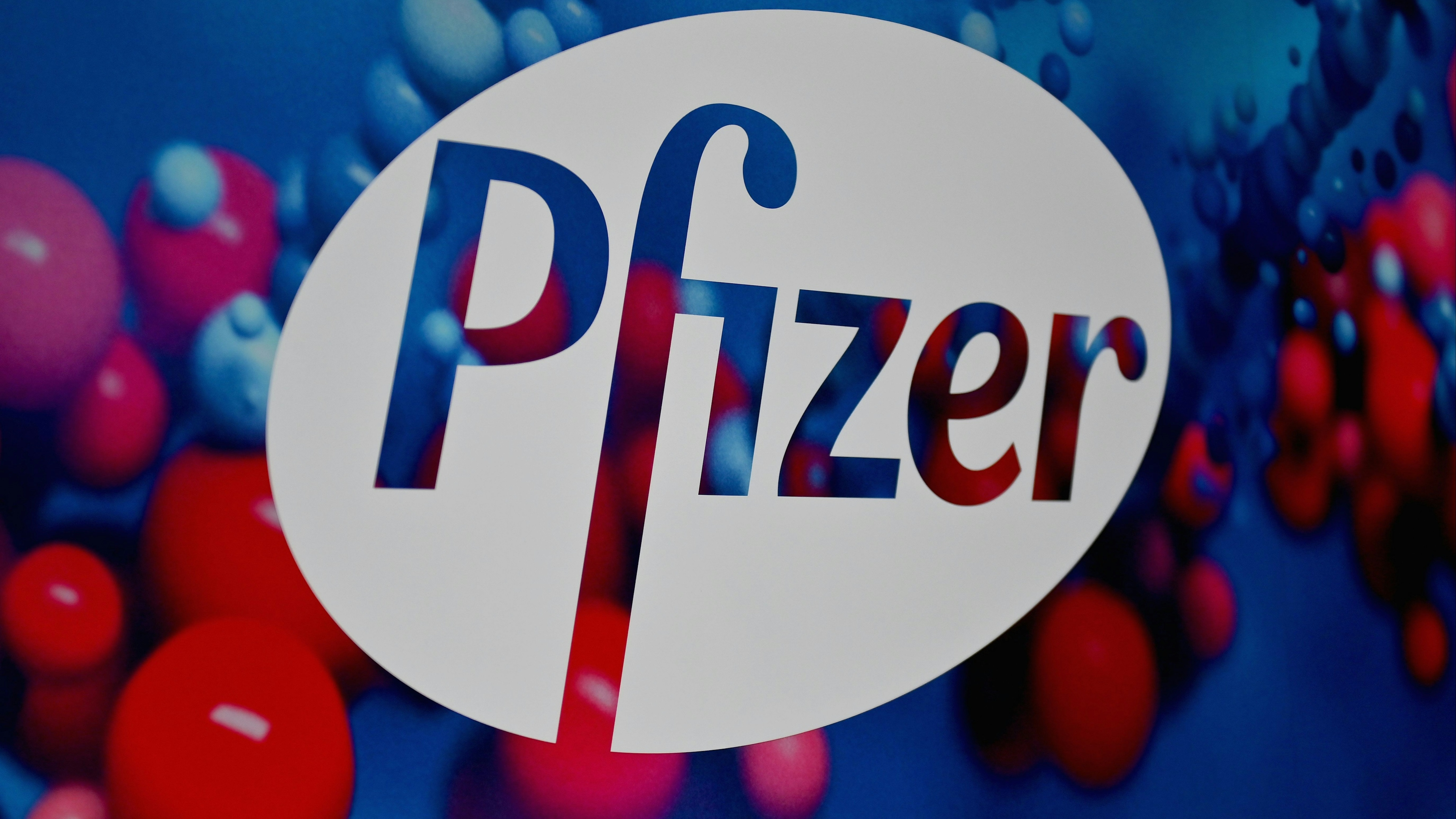 The Pfizer logo is seen at the Pfizer Inc. headquarters on December 9, 2020 in New York City. 