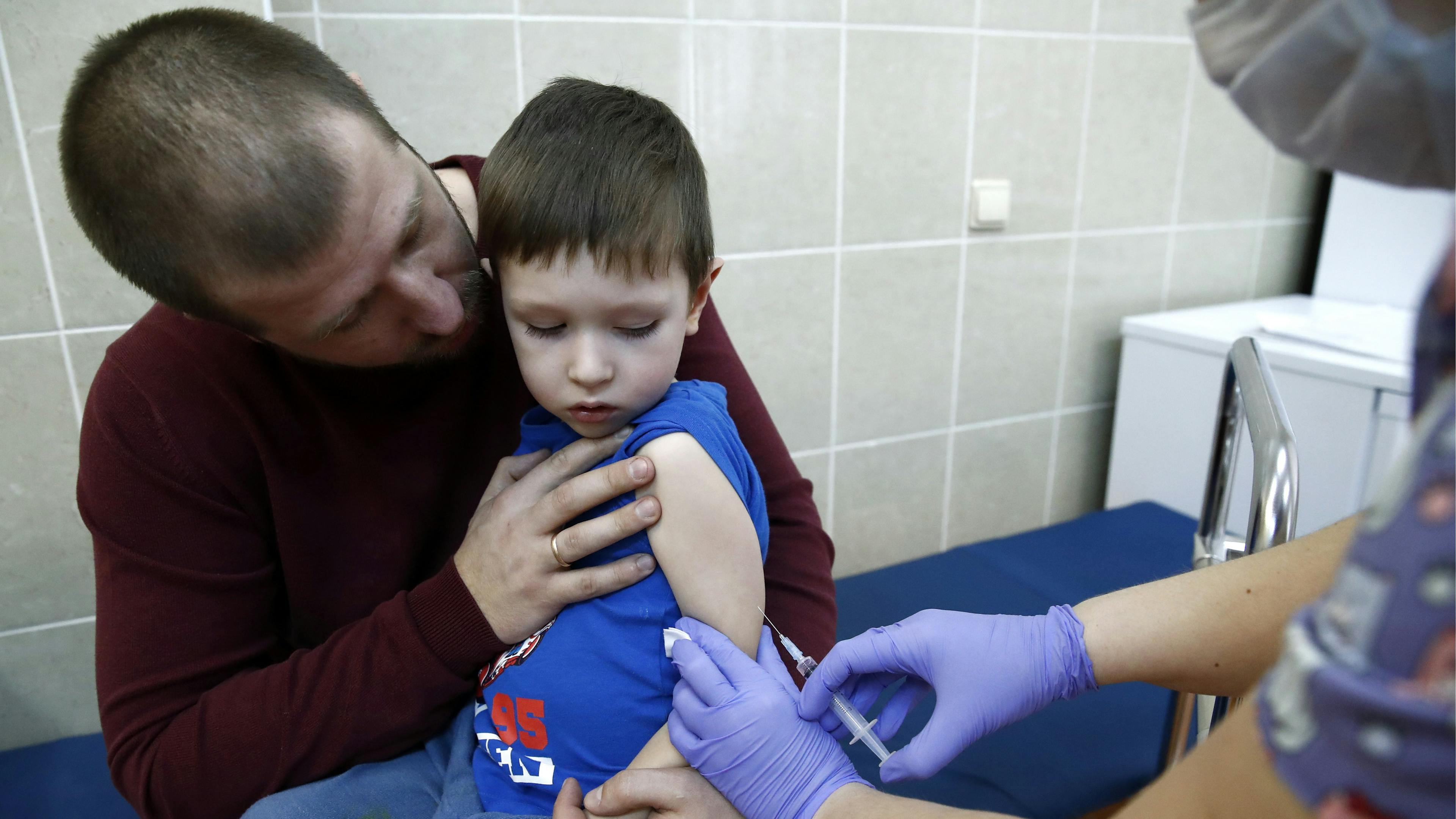 Boy getting MMR vaccine