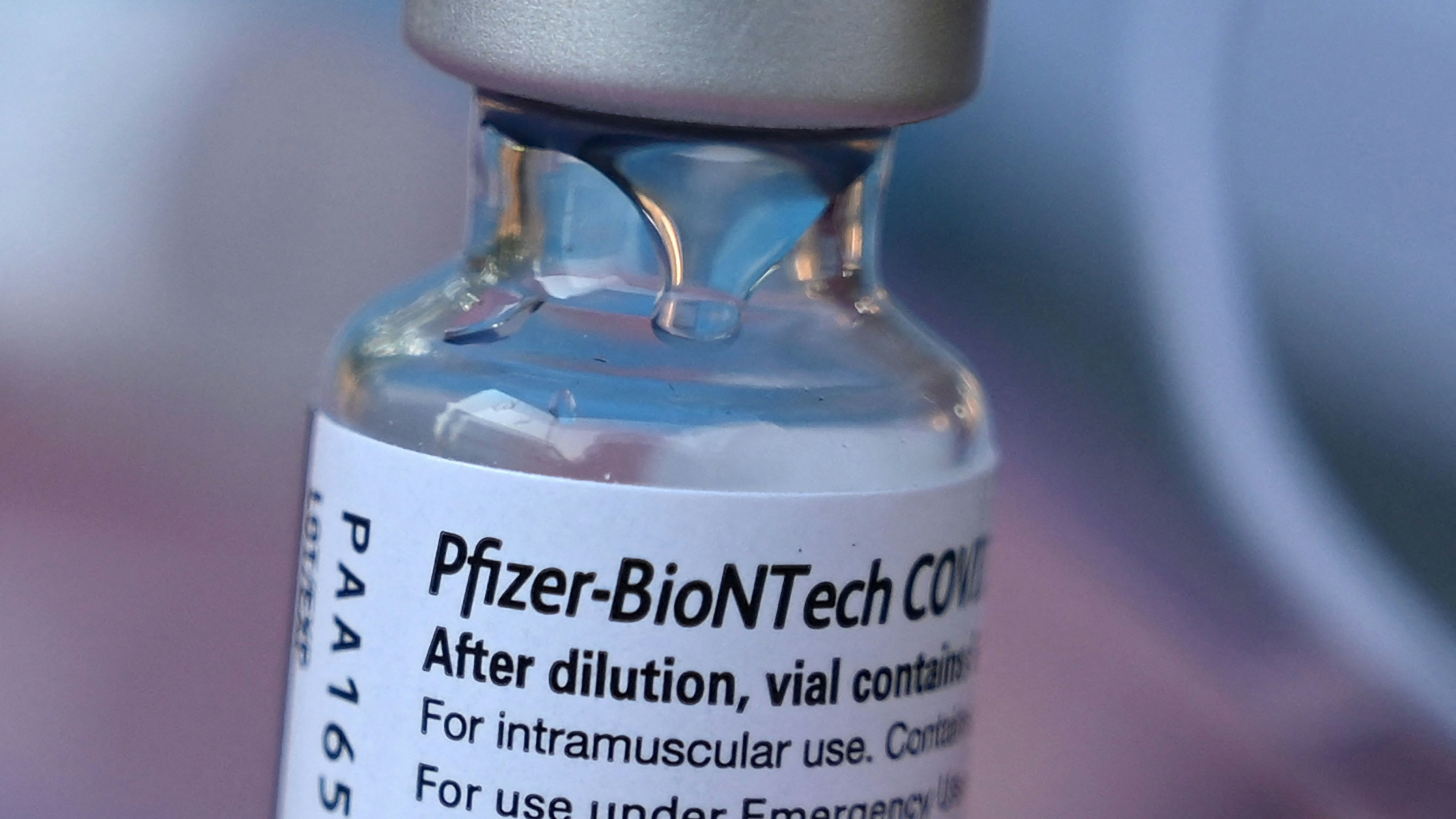 A vial of Pfizer-BioNTech Covid-19 vaccine is seen at a pop up vaccine clinic