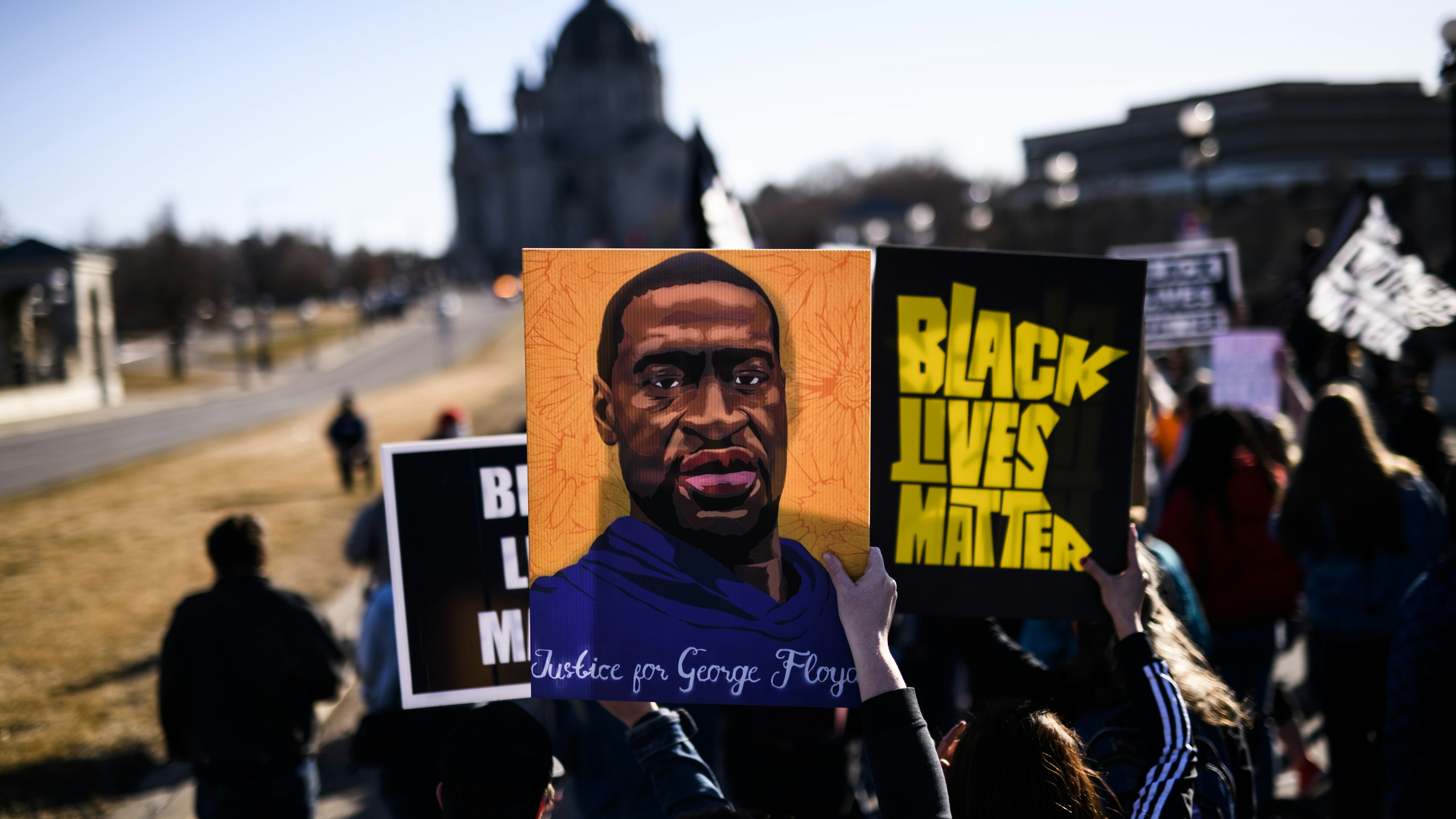 People march near the Minnesota State Capitol to honor George Floyd in St Paul, Minnesota.