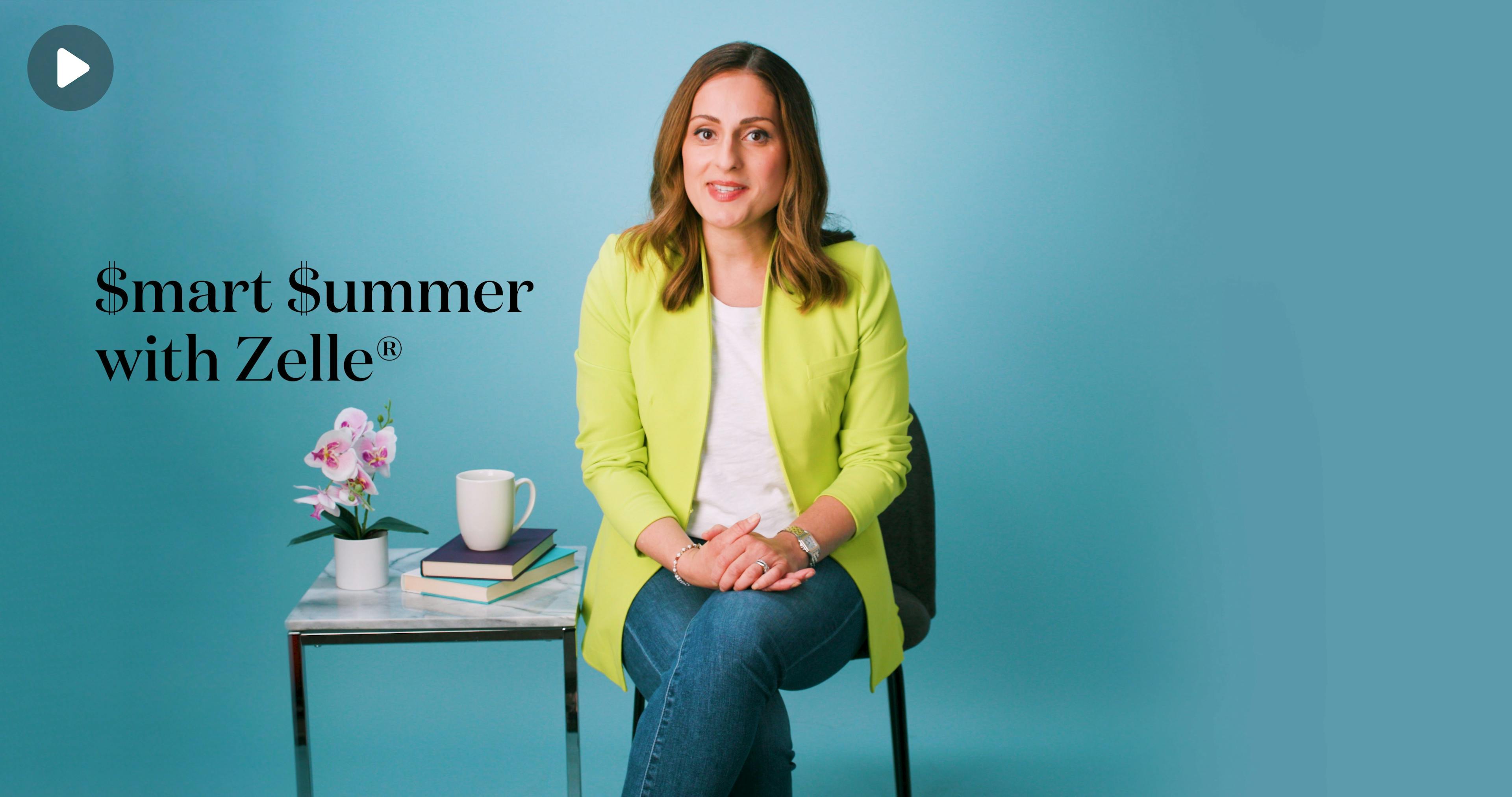Expert Farnoosh Torabi sits in a chair in front of a teal background next to a side table with flowers, books, and a mug