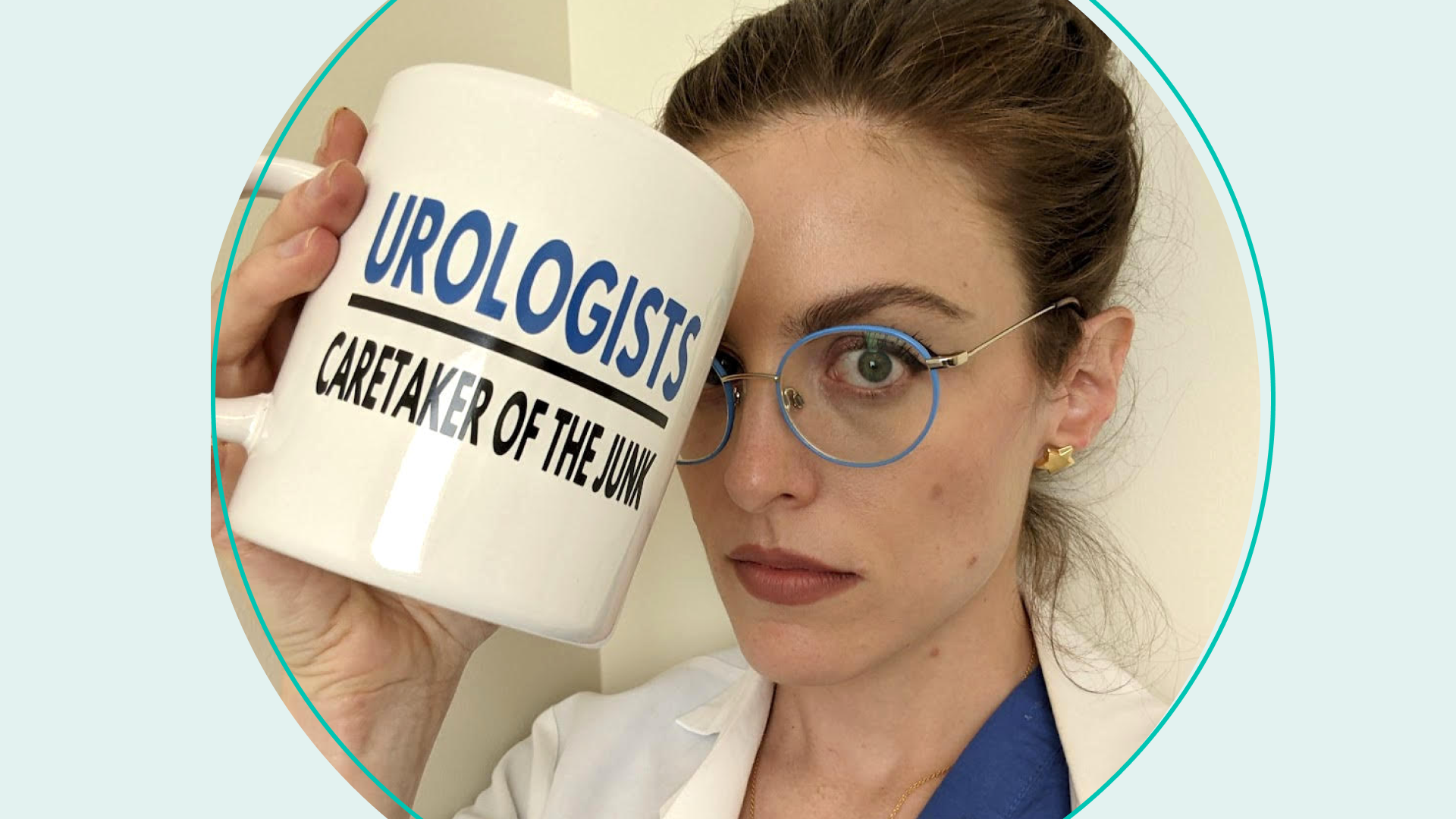 Woman holding up mug that says urologists caretaker of the junk 