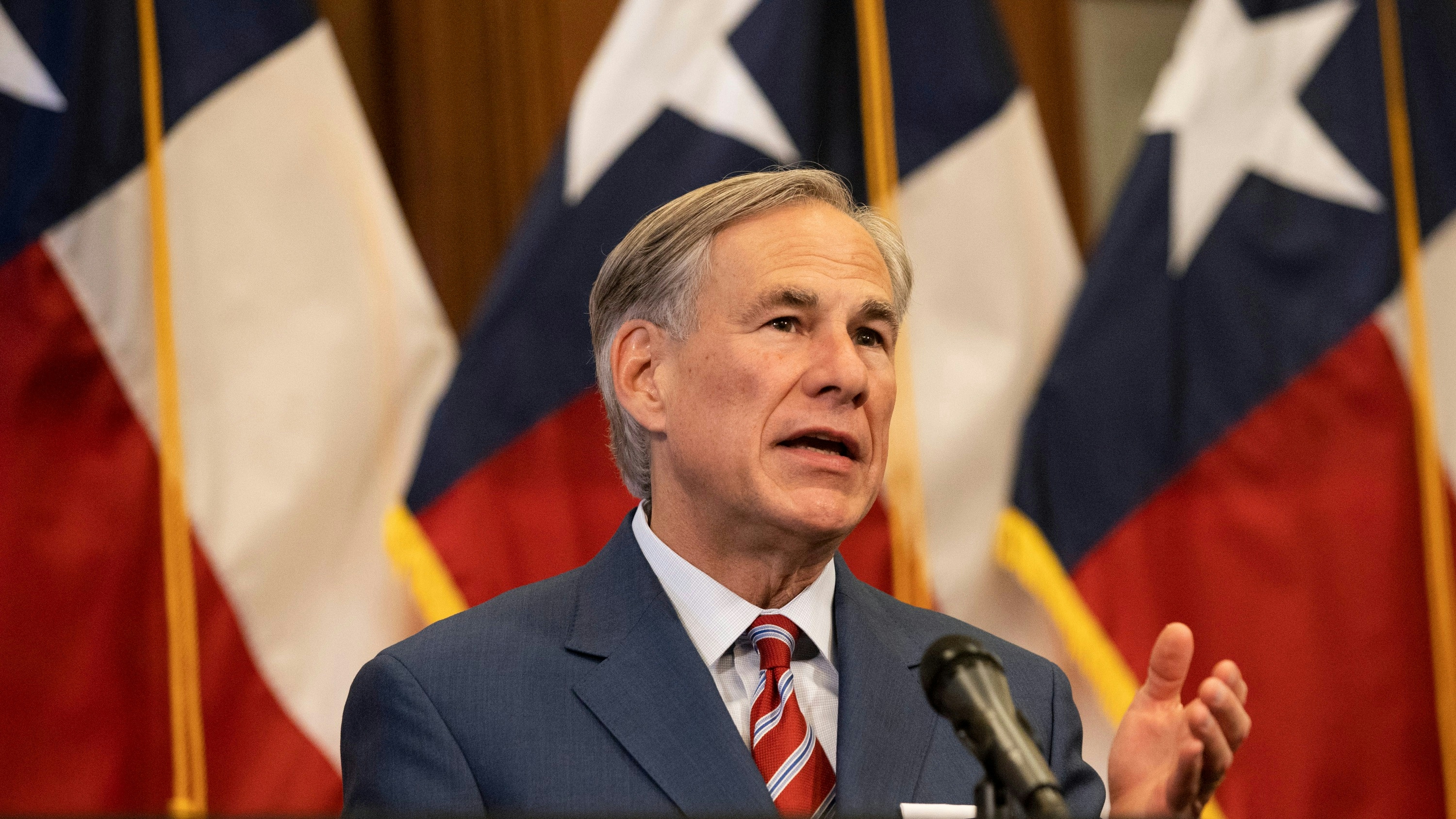 Texas Governor Greg Abbott announces the reopening of more Texas businesses during the COVID-19 pandemic at a press conference at the Texas State Capitol in Austin on Monday, May 18, 2020.