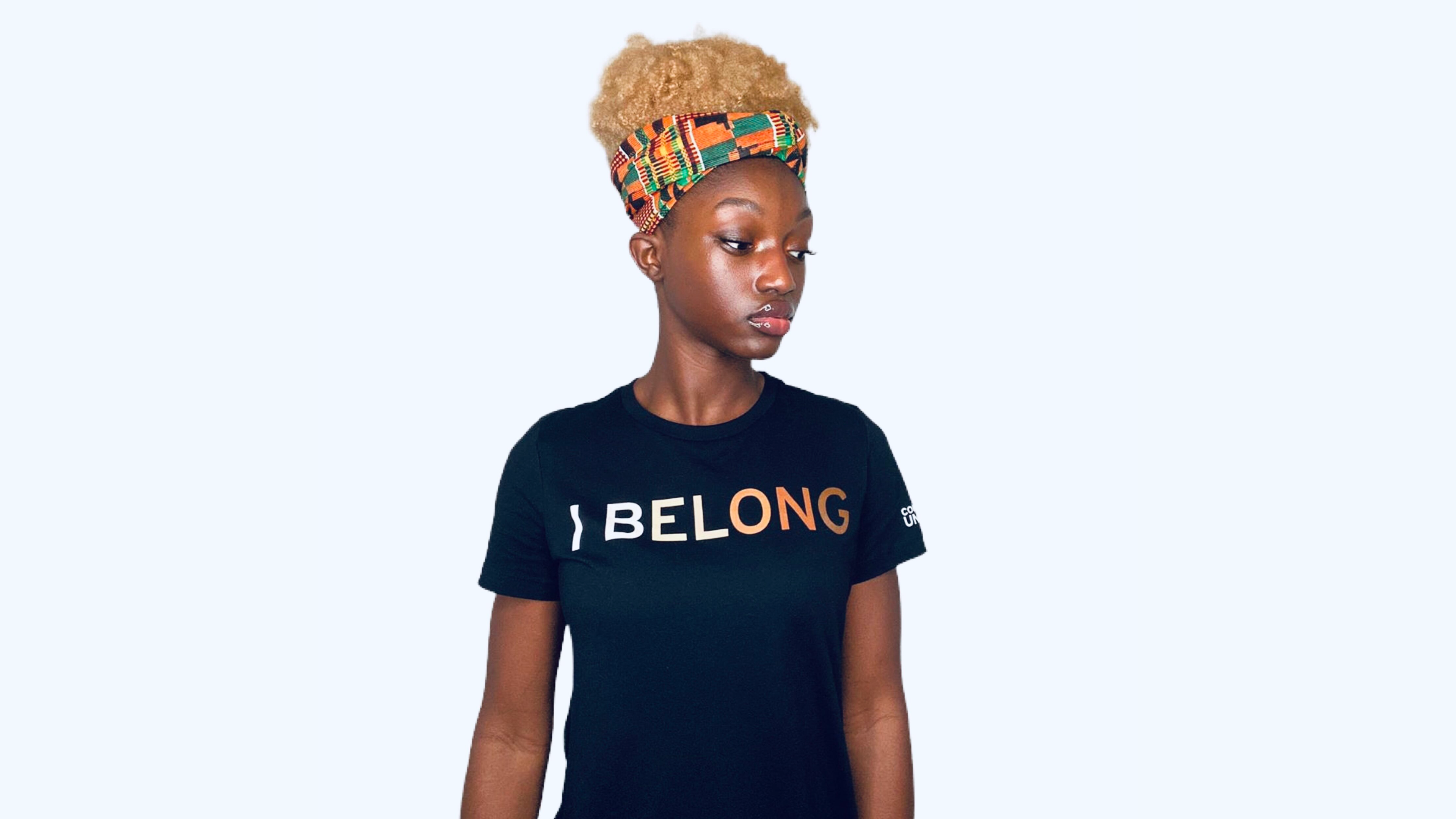 black t-shirt with 'I Belong' saying printed on the front in different colors